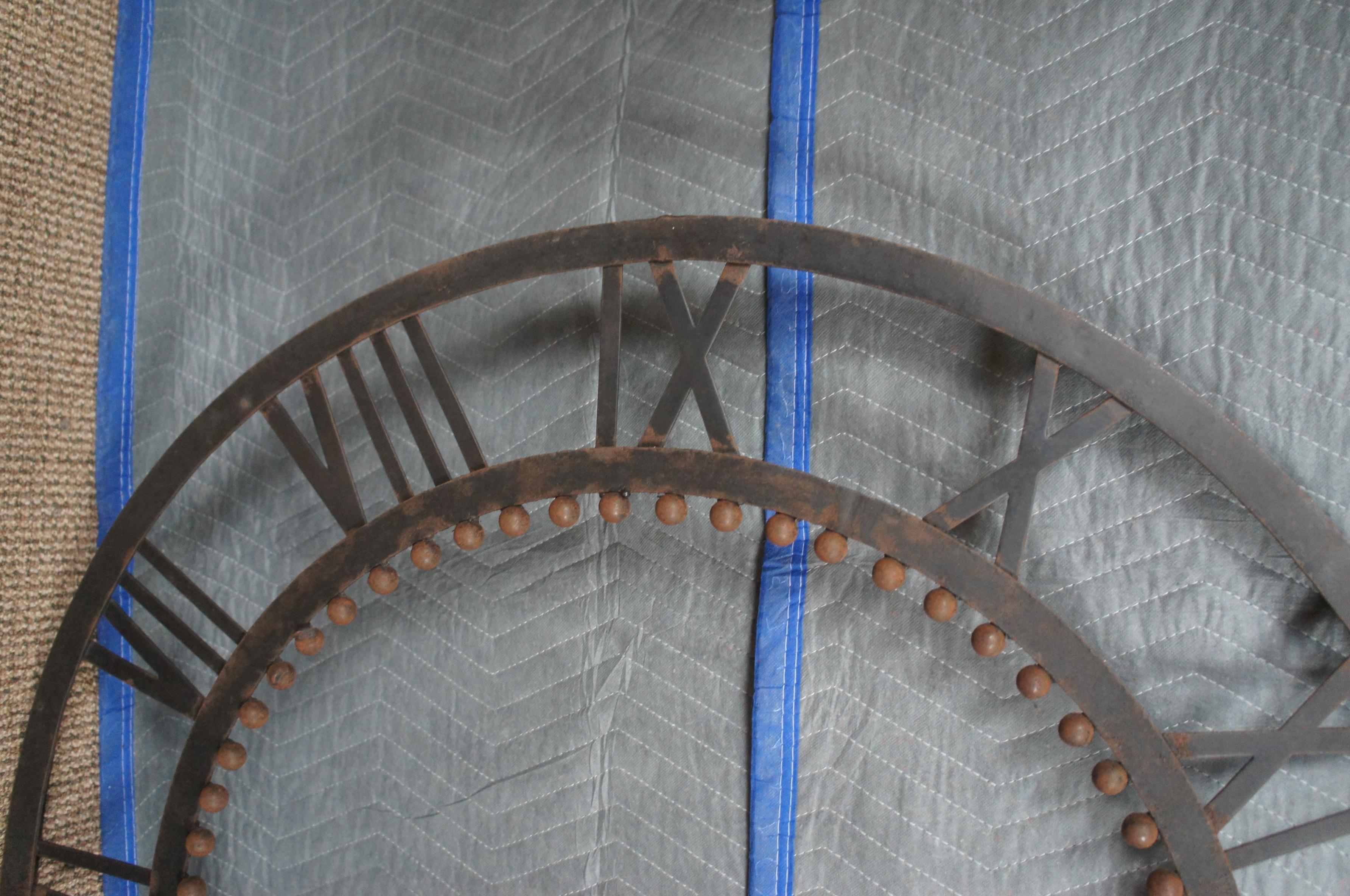 Global Views Sculptural Rustic Iron Decorative Wall Cock Roman Numerals 3