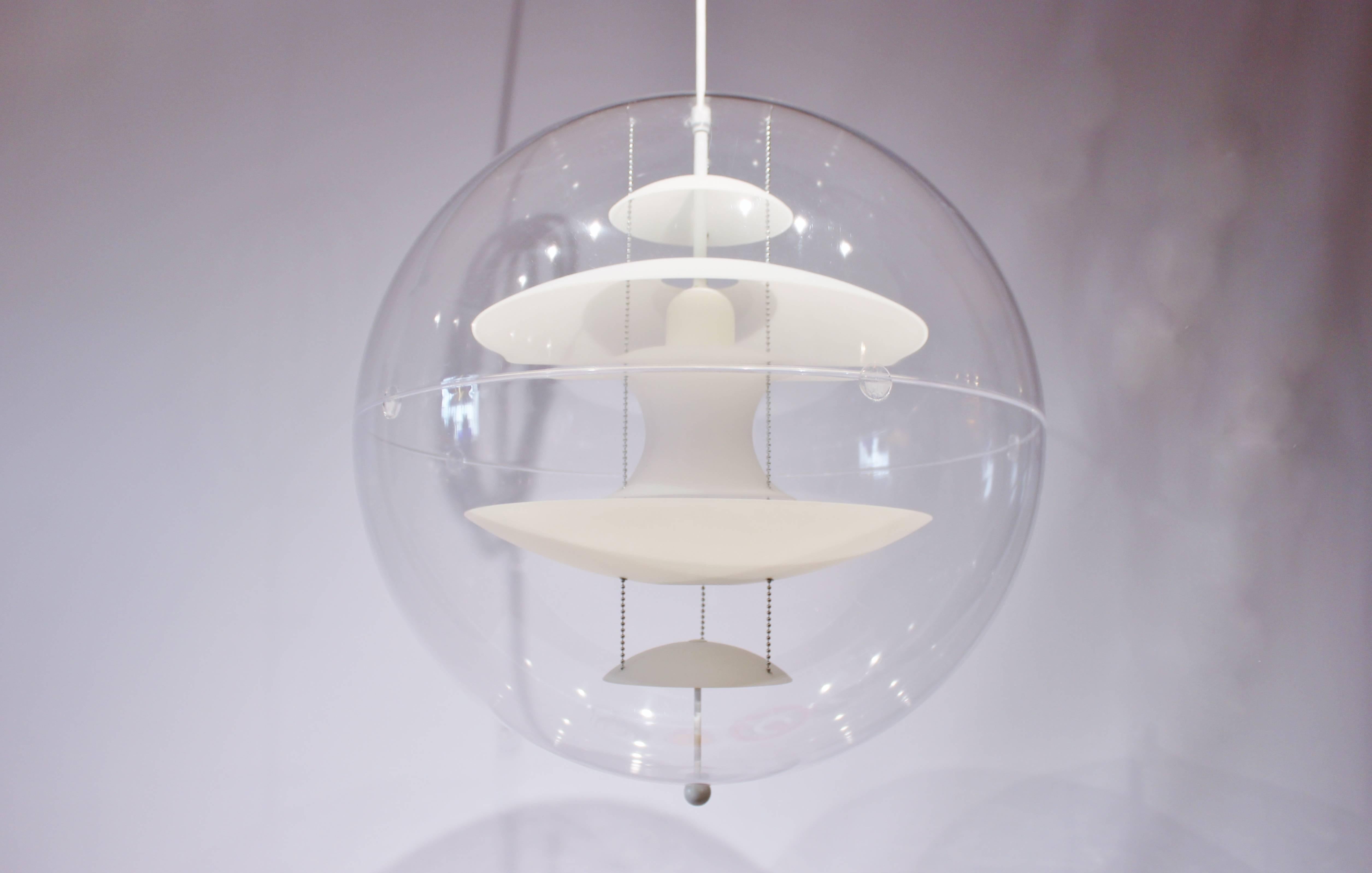 Globe, designed by Verner Panton in 1969. The lamp is a transparent acrylic globe with five hanging reflectors in white opaline glass. Measure: 50 cm.