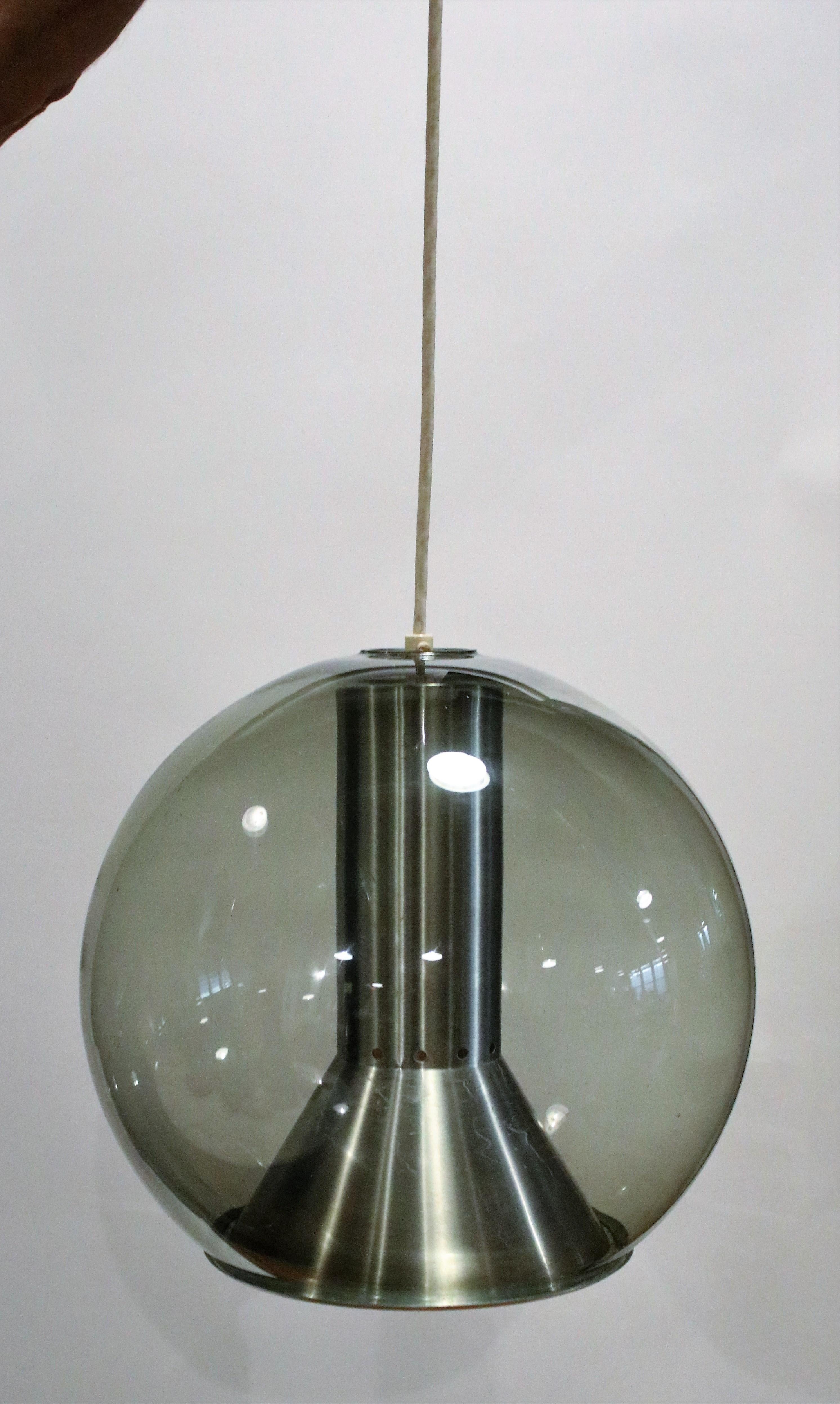 Smoked glass model B 1040-20 globe ceiling lamp by Franck Ligtelijn for RAAK, Amsterdam 1960s, wired and working.