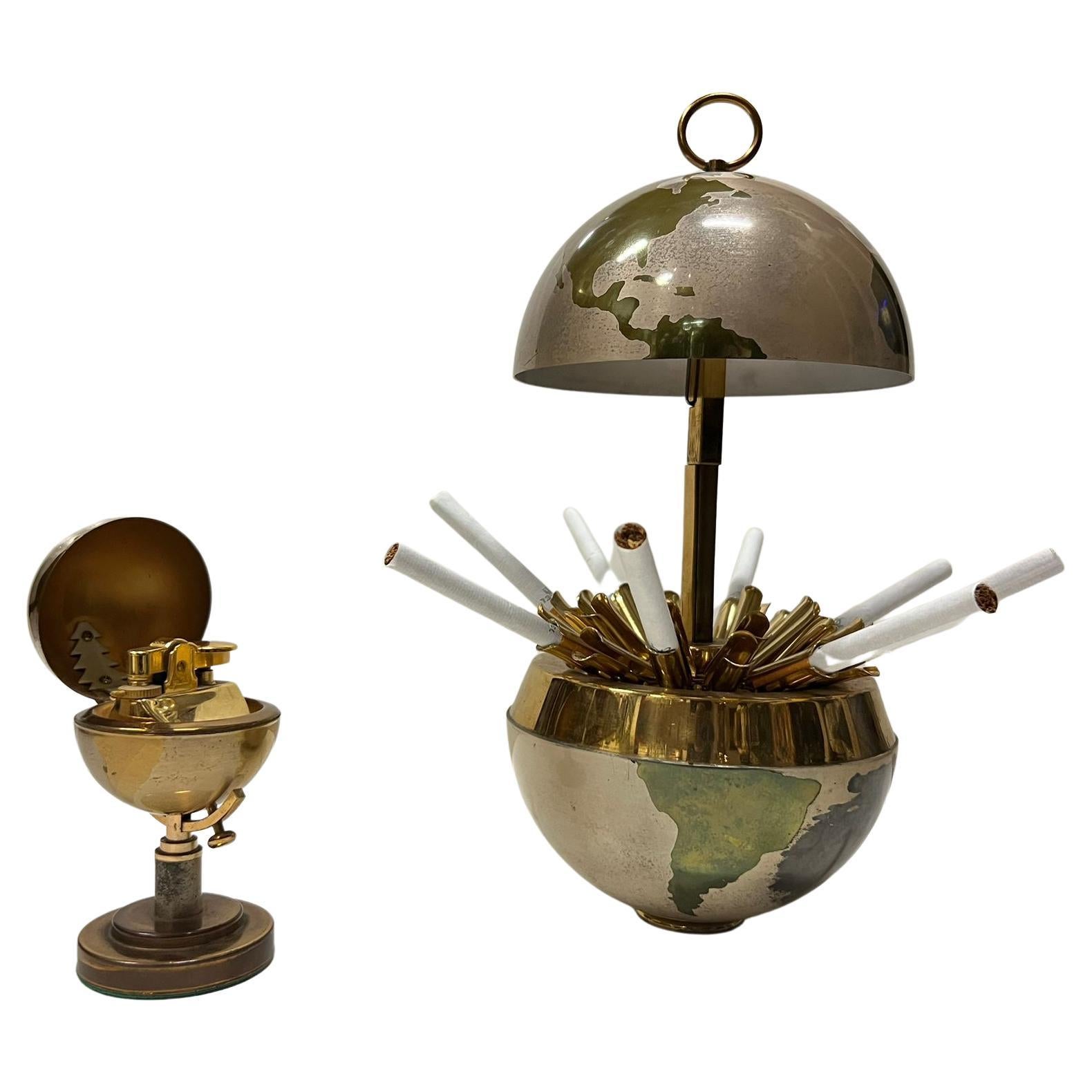 Globe cigarette dispenser with globe lighter, brass, Germany, 1950s, 

Defects on the cigarette dispenser:
a slight dent
in two places the paint is rubbed off due to use (see the last photo).

