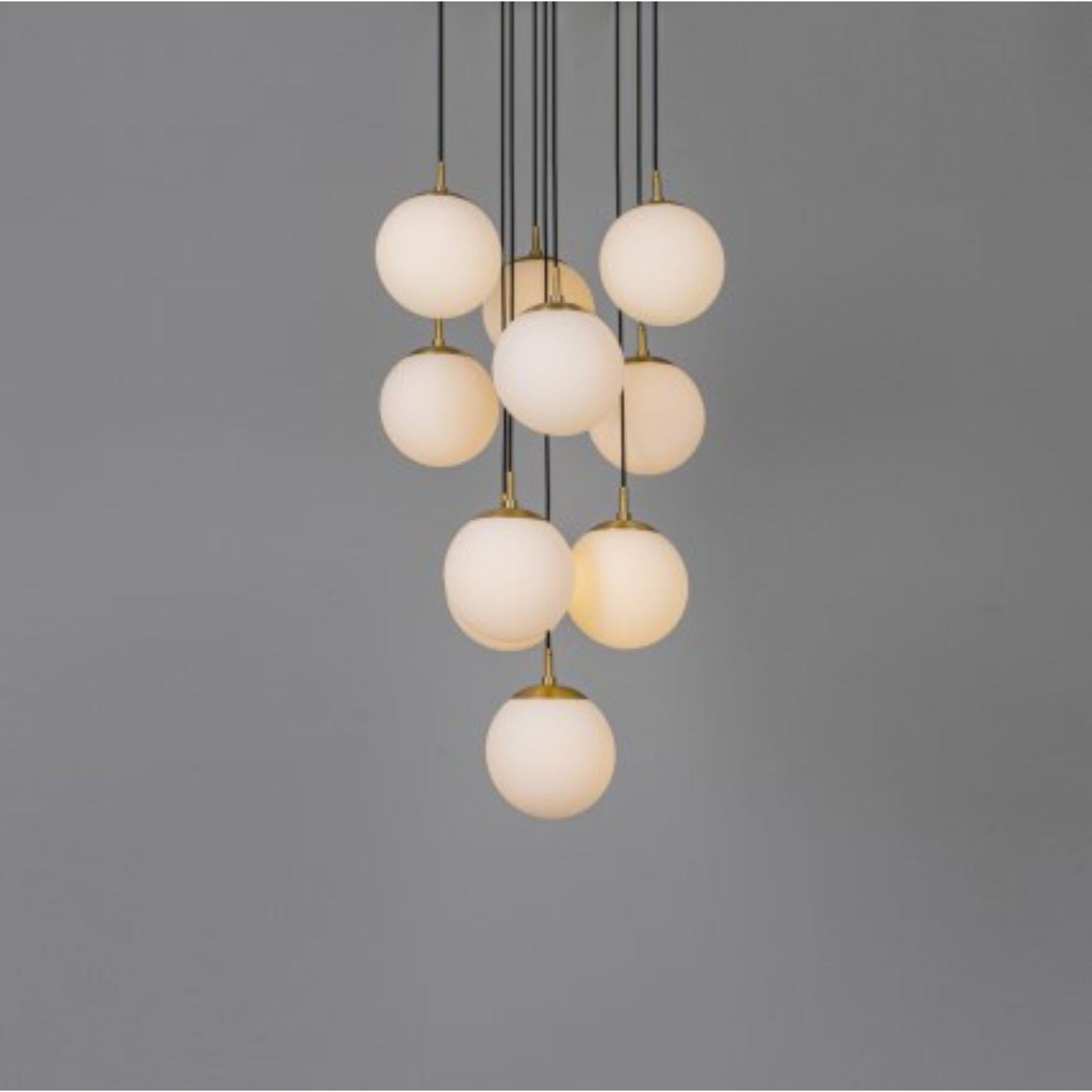 Globe cluster 10 chandelier by Schwung
Dimensions: D 60 x H 155.4 cm
Materials: Brass, opal glass
Weight: 20.2 kg

Finishes available: Black gunmetal, polished nickel, brass
Other sizes available.

 Schwung is a german word, and loosely