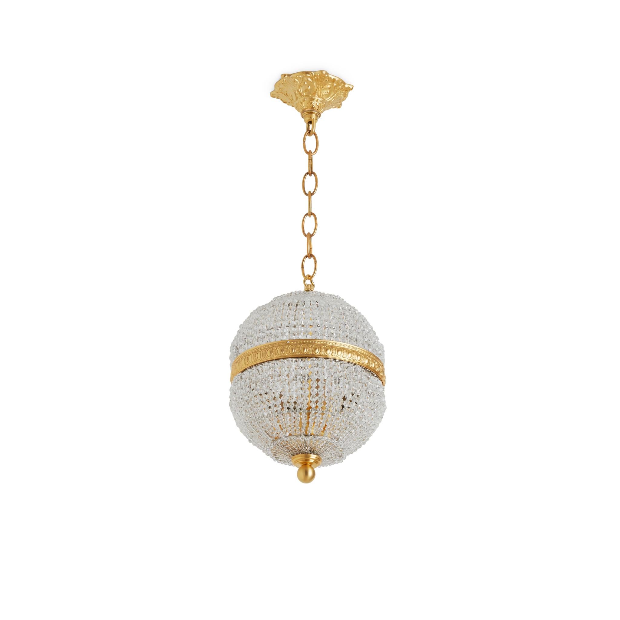 Globe Crystal Hand-Beaded Small Pendant Light with Gold Plate finish (with chain) is designed with Neoclassical and Edwardian influences and details in mind. This hand-beaded sculptural pendant is made with painstaking-care at our U.S. based