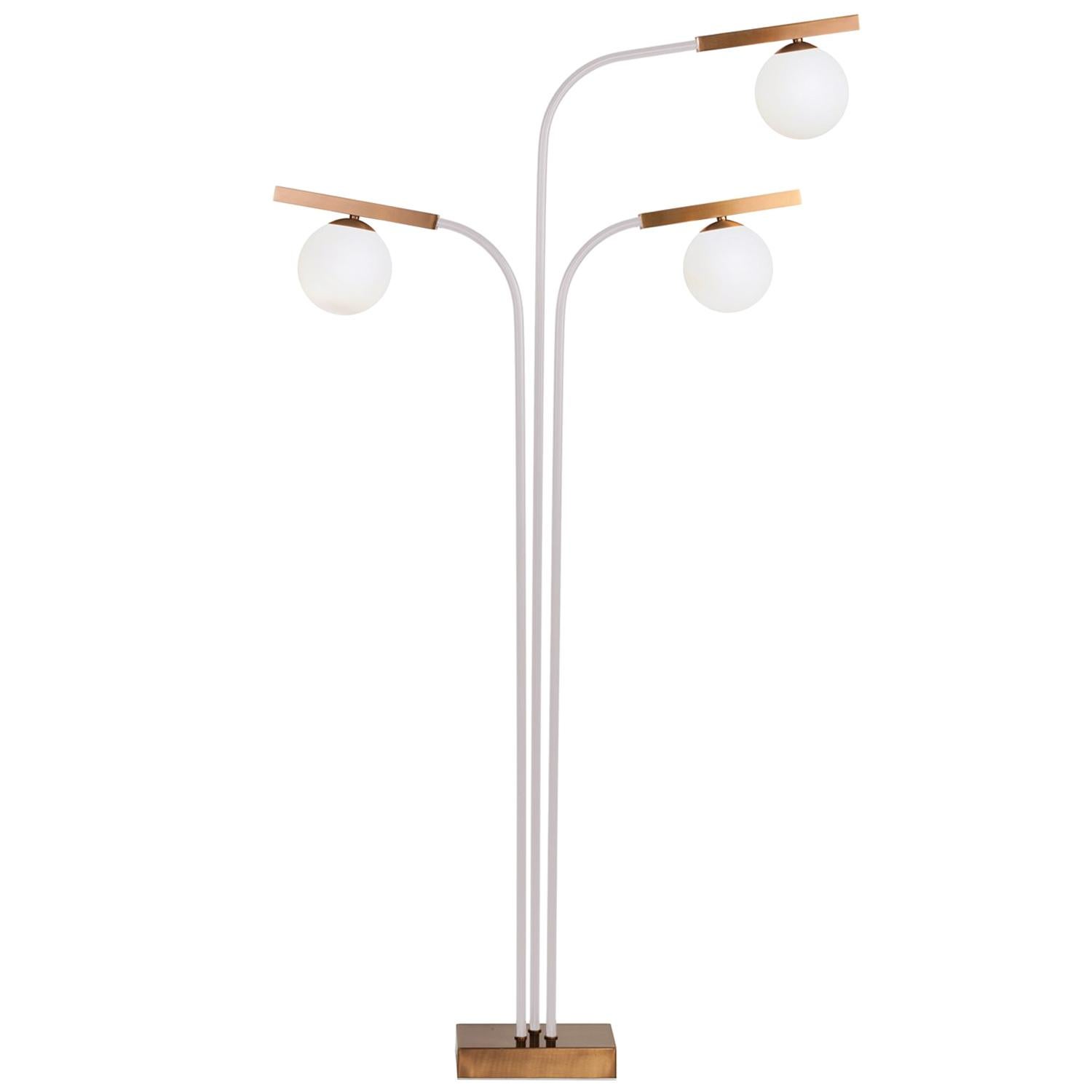 Globe Floor lamp is a stunning, timeless lamp with a delicate bronze and lacquered metal structure and soft opal glass globes. Other finishes available.
 Made to Order.

Part of the Mambo Unlimited Ideas design group, at Utu lamps the lighting field