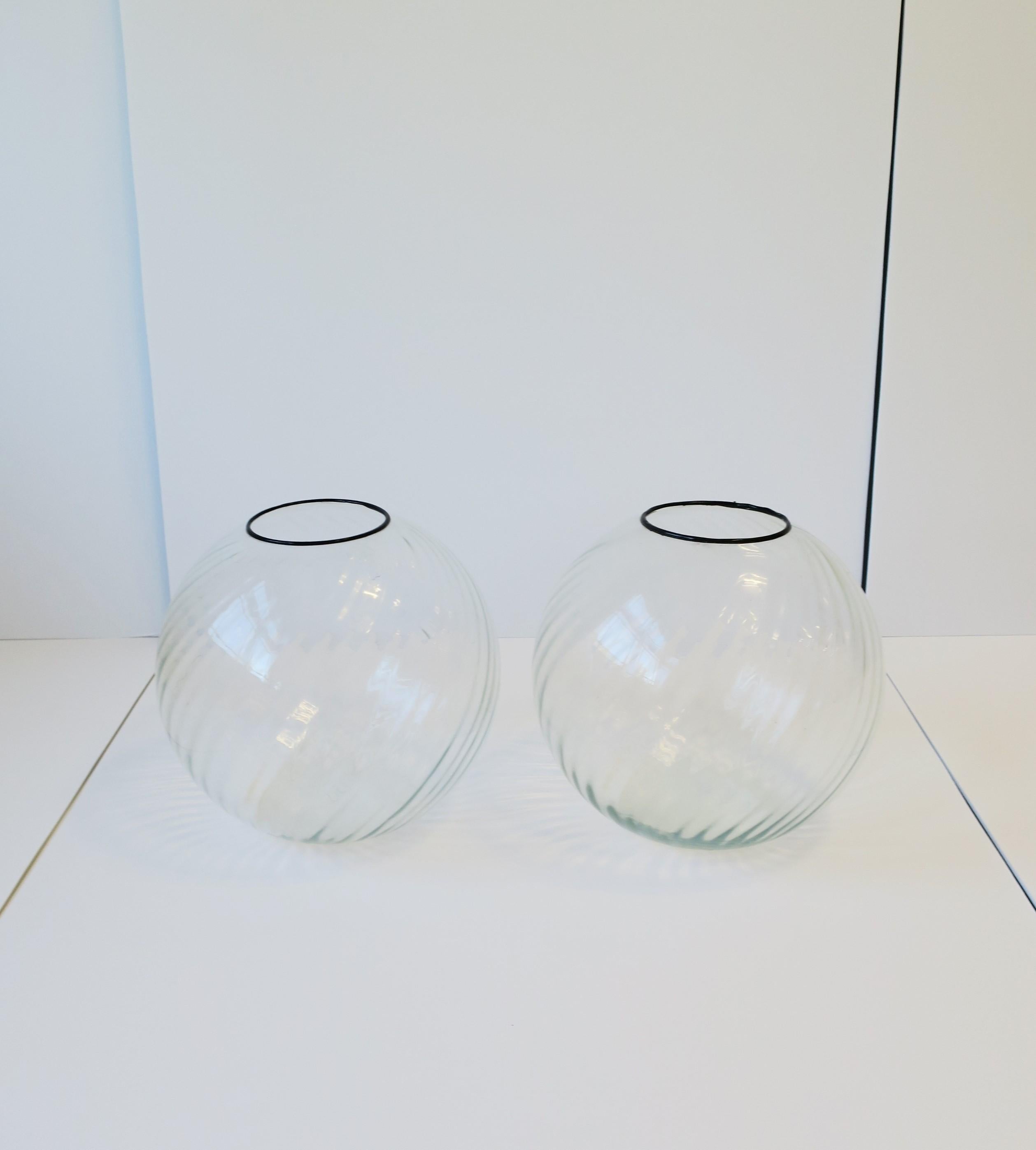 A relatively large pair of '70s modern round globe fluted glass vases with black detail at neck/rim, circa 1970s. Dimensions: 10.5