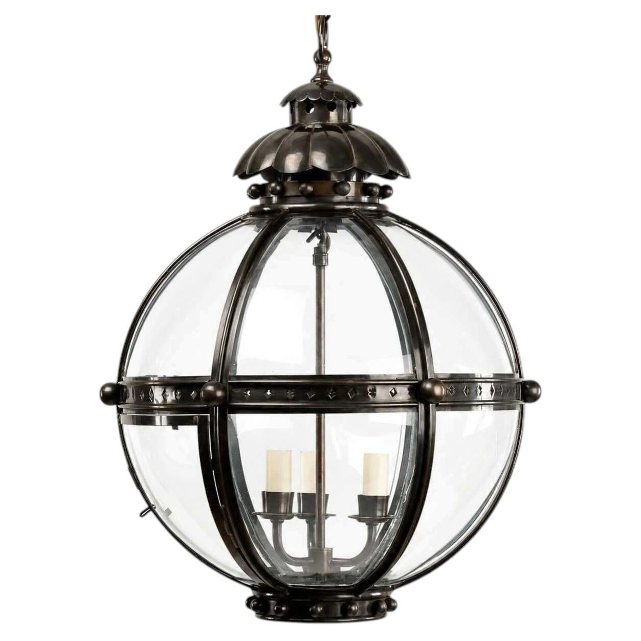 Lanterne sphérique en laiton et bronze en vente