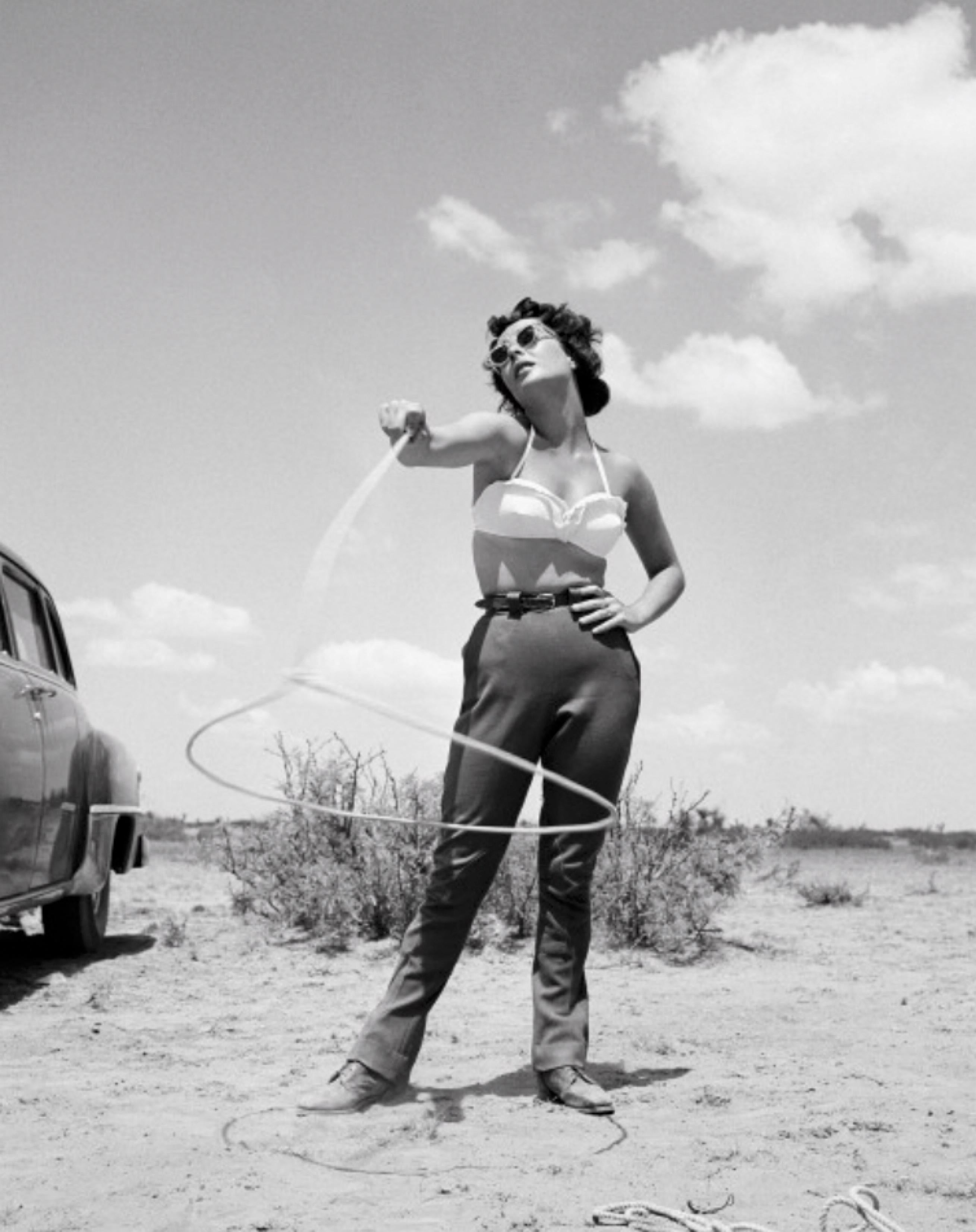 Globe Photo Archives Black and White Photograph - Elizabeth Taylor Spinning Lasso in "Giant" -  Oversize Limited Print 