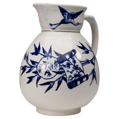 Globe Pottery. Tunis design. A large Aesthetic Movement blue and white jug