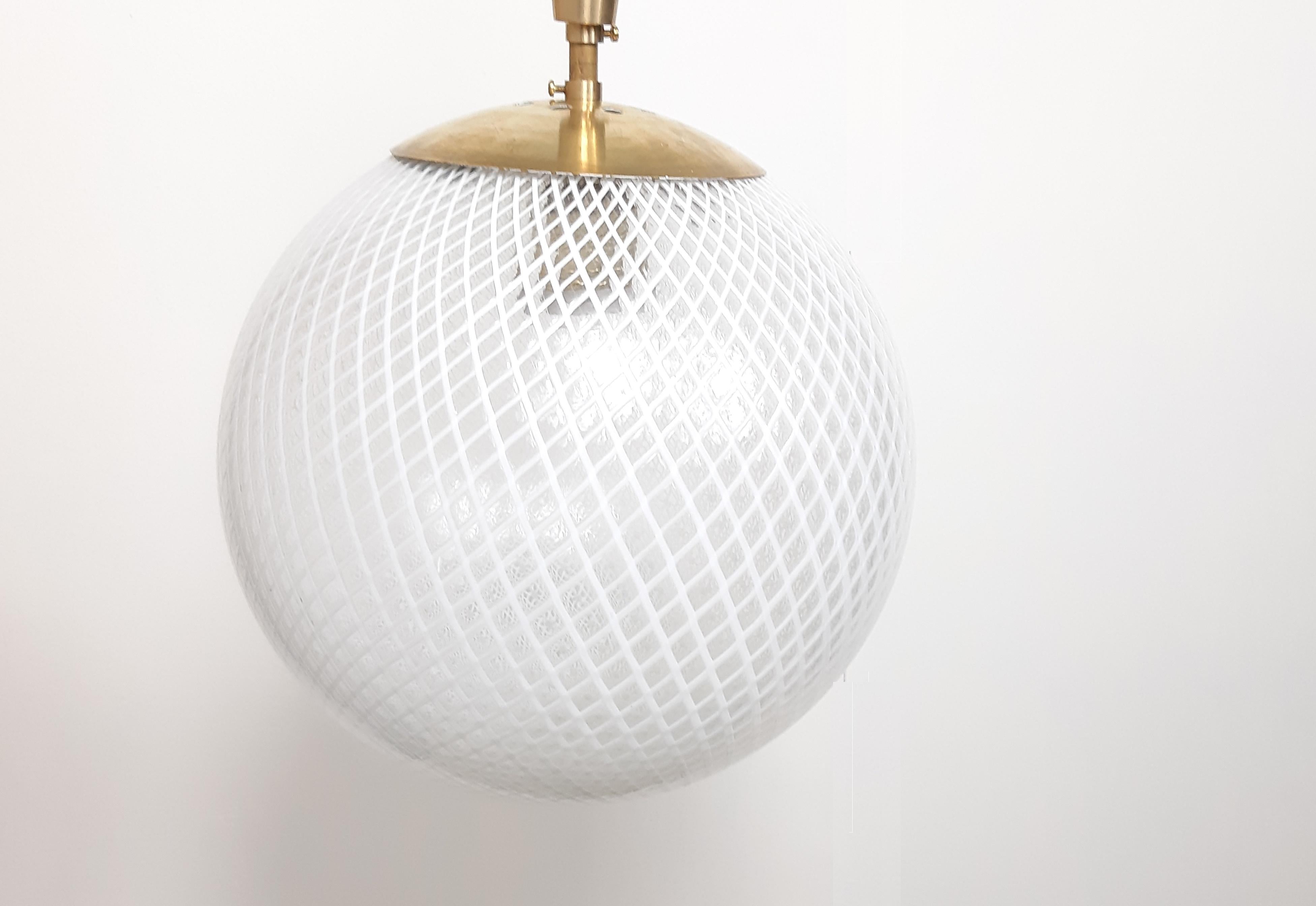 Hand blown glass sphere and conical shaft attributed to Carlo Scarpa for Venini. Amazing execution in Reticello glass.