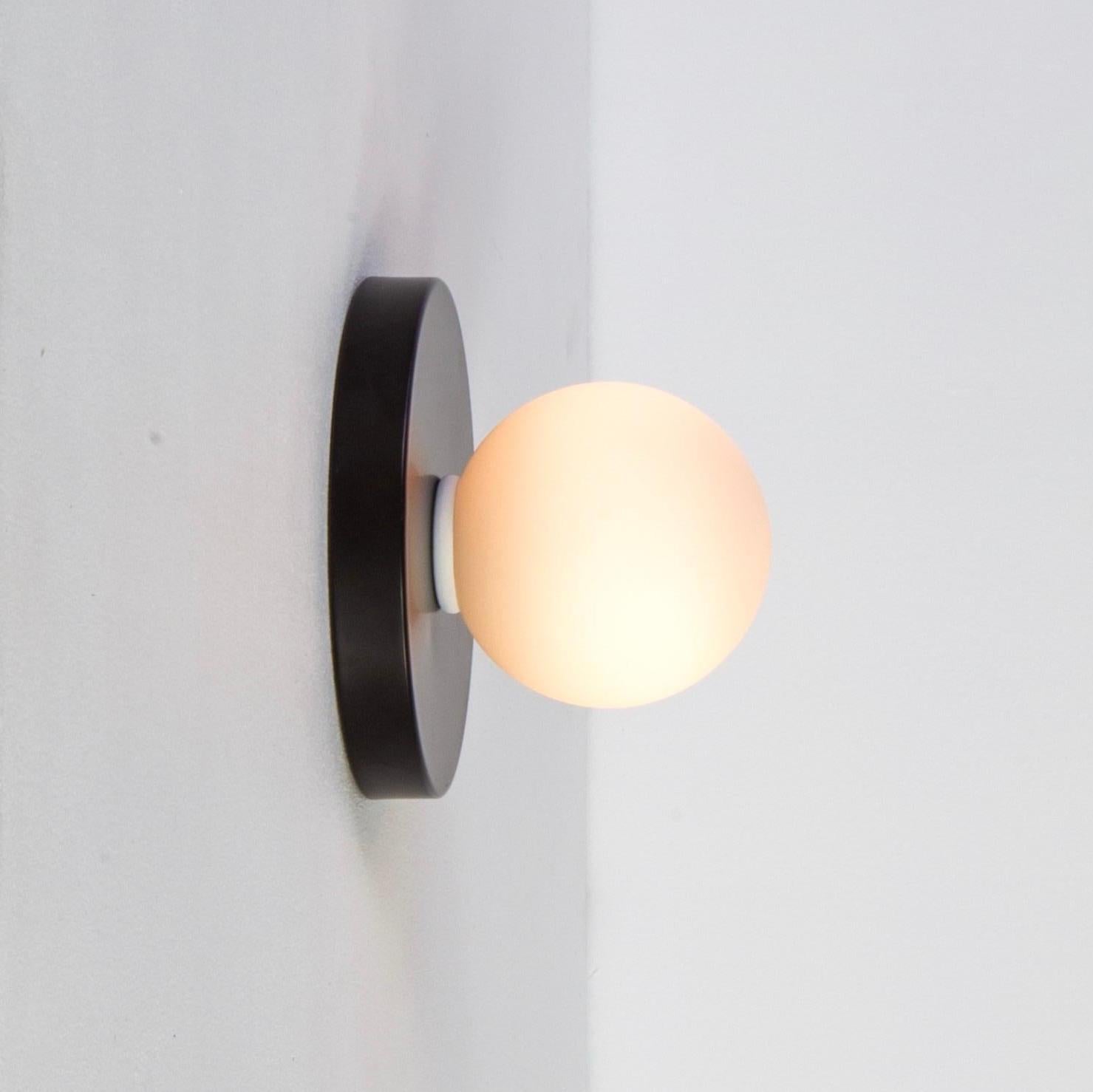 Modern Globe Sconce by Research.Lighting, Black, In Stock For Sale