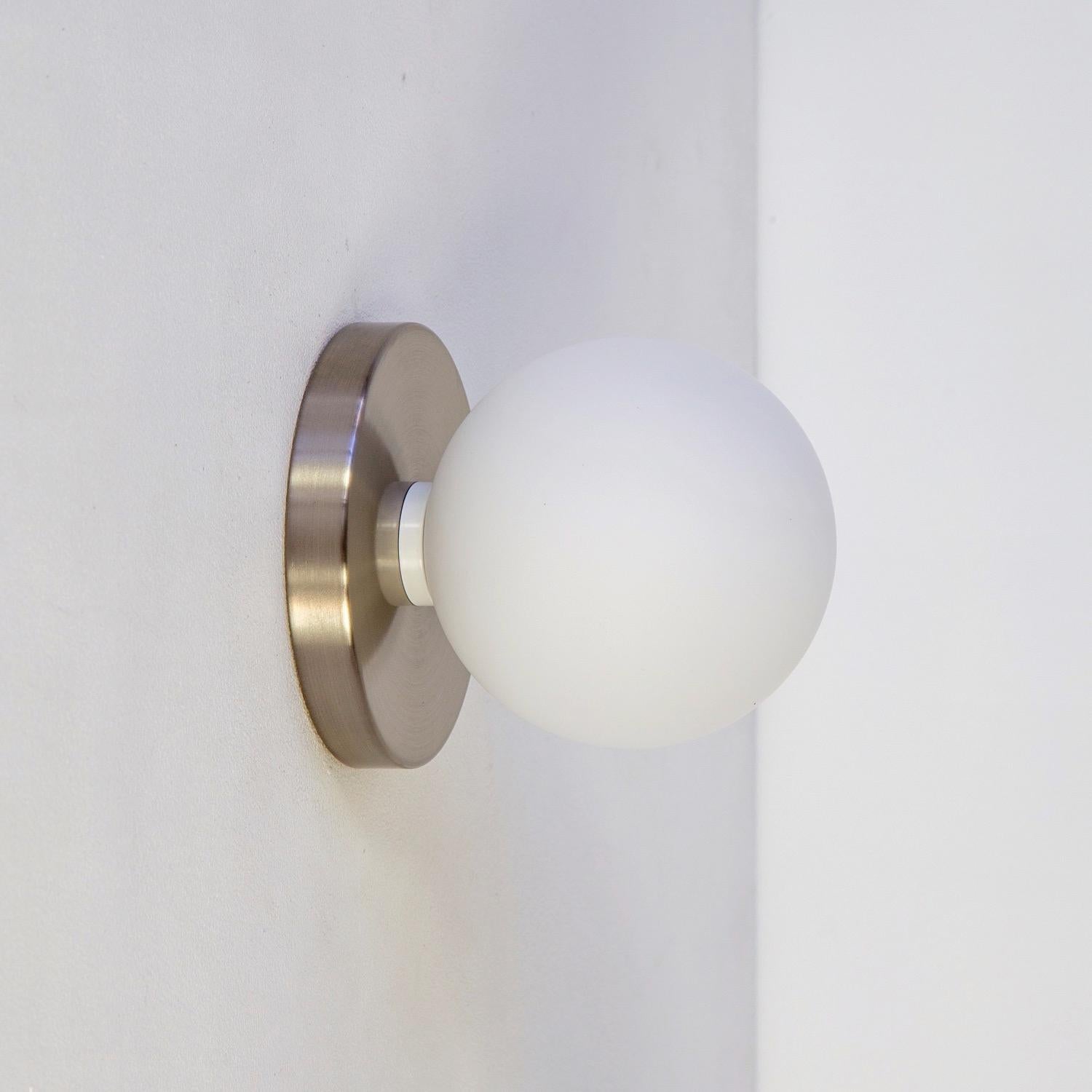 American Globe Sconce by Research.Lighting, Brushed Nickel, 5in Glass, In Stock For Sale