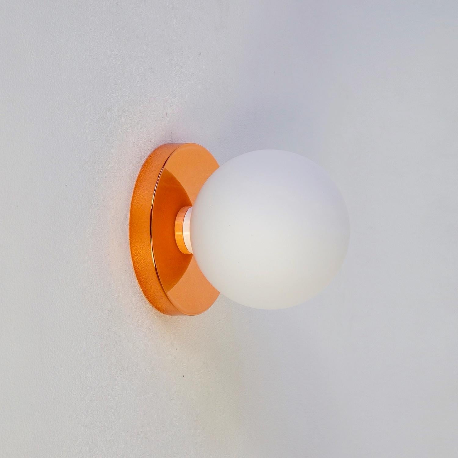 Modern Globe Sconce by Research.Lighting, Polished Copper, 5in Glass, In Stock For Sale