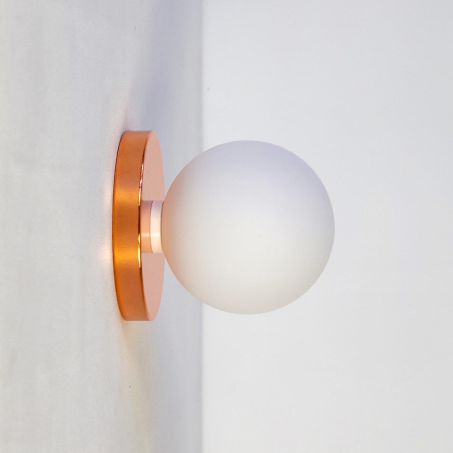 Contemporary Globe Sconce by Research.Lighting, Polished Copper, 5in Glass, In Stock For Sale