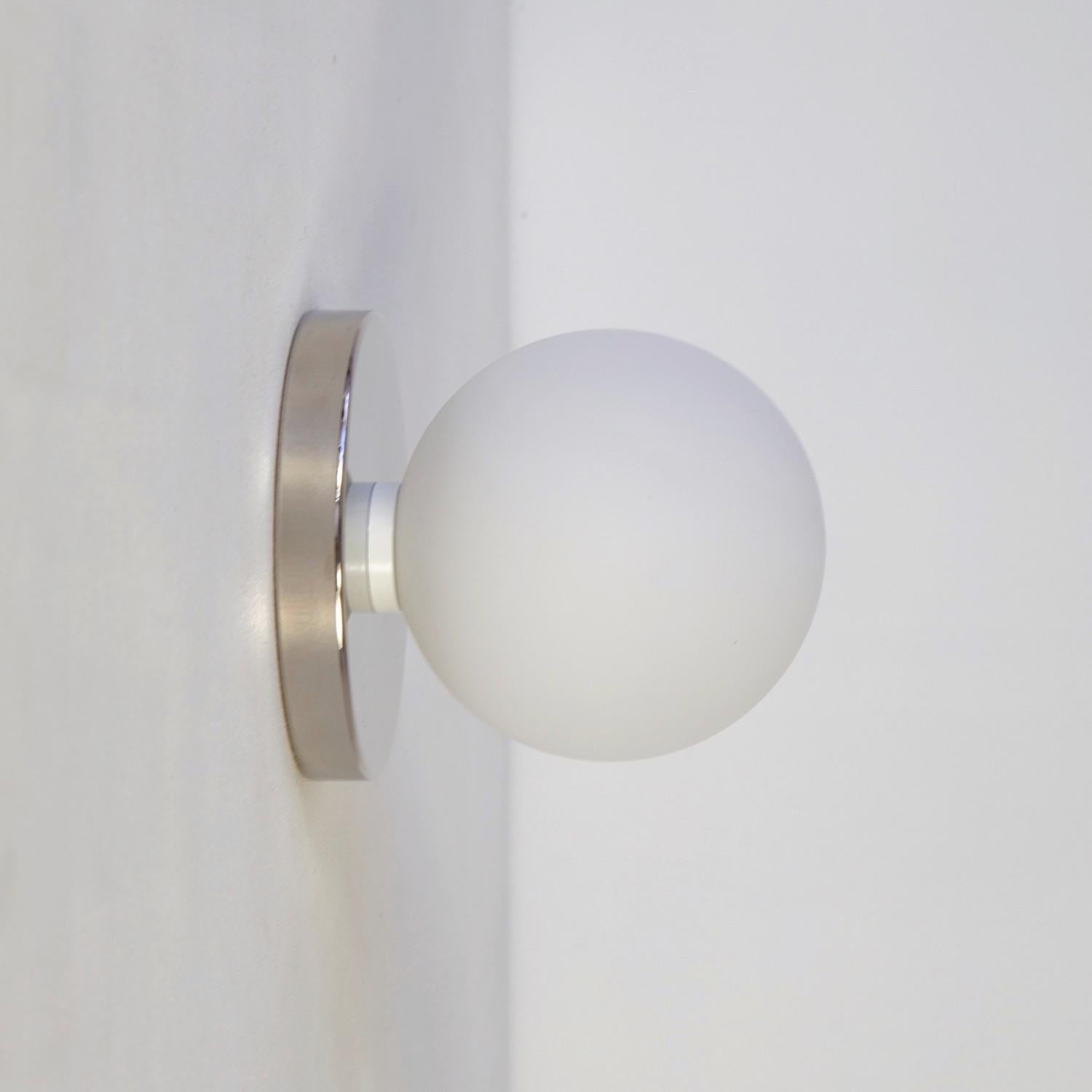 Globe Sconce by Research.Lighting, Polished Nickel, 5in Glass, Made to Order In New Condition For Sale In Brooklyn, NY