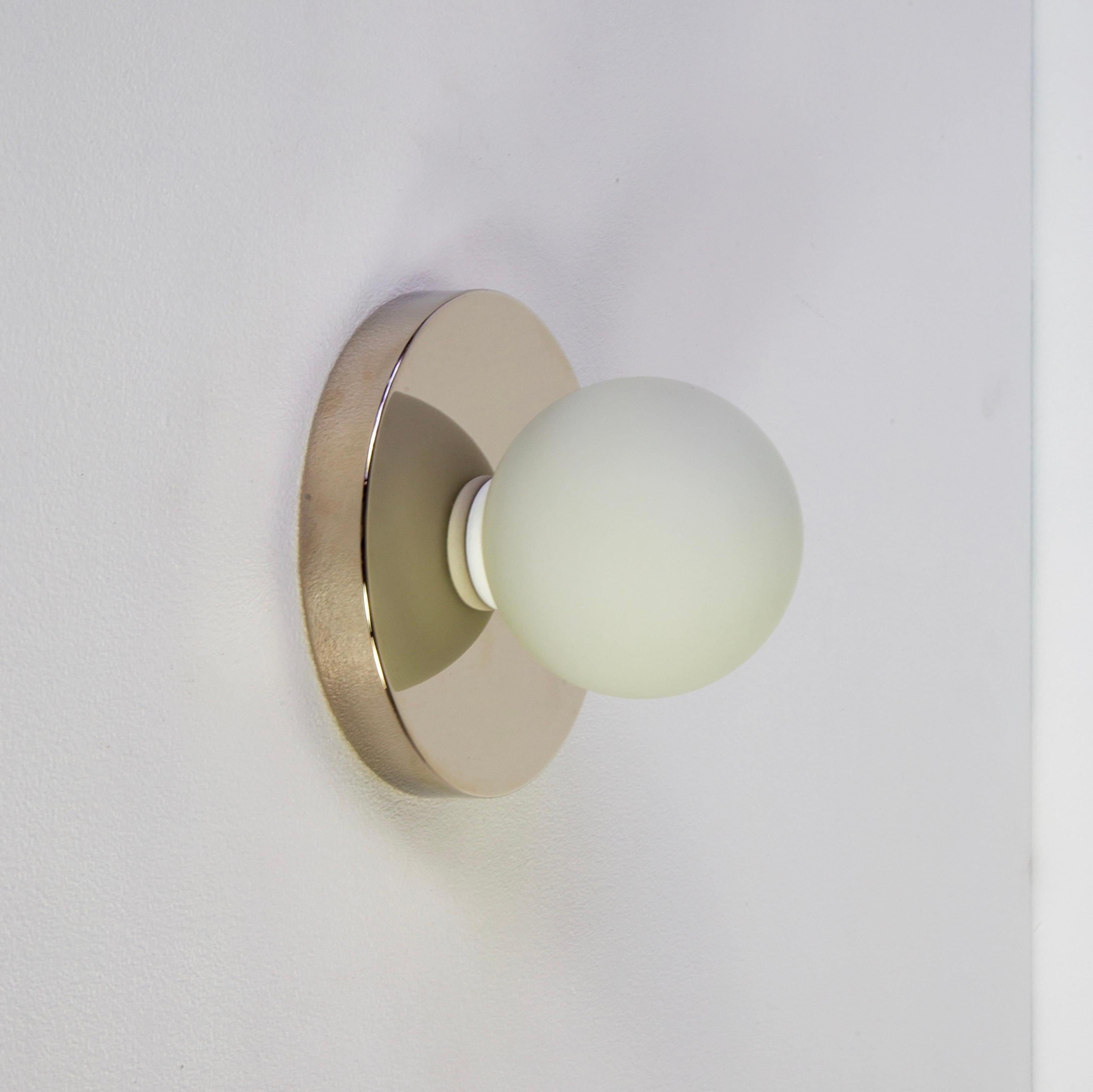 Modern Globe Sconce by Research.Lighting, Polished Nickel, In Stock For Sale