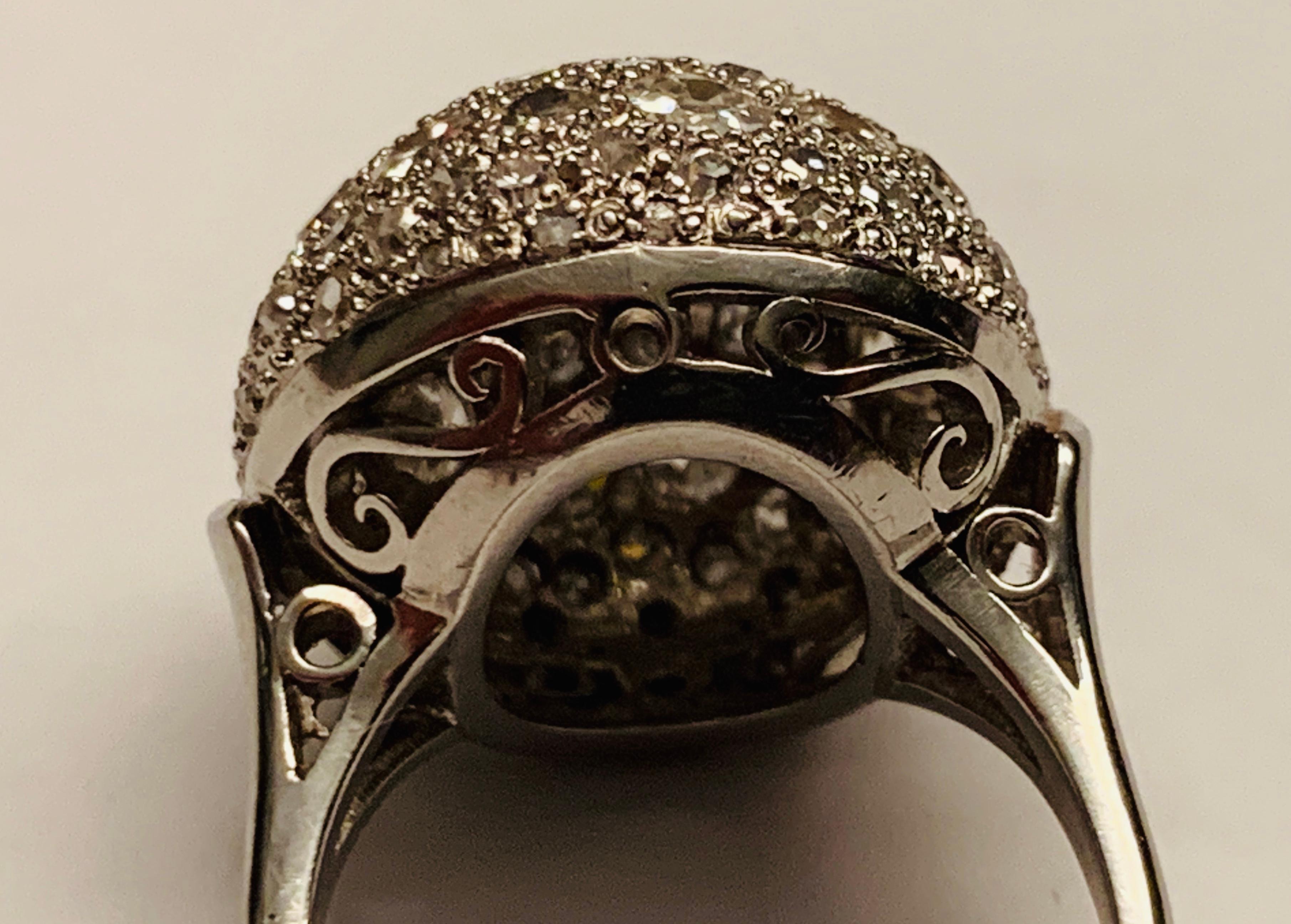 Unique Ring in Platinum and Iridium, featuring a globe shaped motive wich is pavé set with 90 old cut Diamonds with an approximate weight of 2.70 ct. 
The ring is currently size 52/12 but can be resized larger or smaller if necessary.