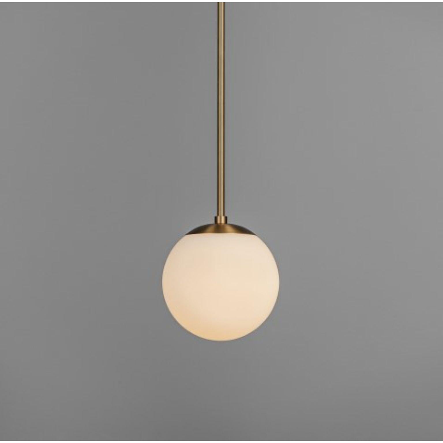 Globe Single Pendant by Schwung
Dimensions: D 20 x H 142.7 cm
Materials: Brass, Opal glass
Weight: 2.6 kg

Finishes available: Black gunmetal, polished nickel, brass
Other sizes available.

 Schwung is a german word, and loosely defined, means
