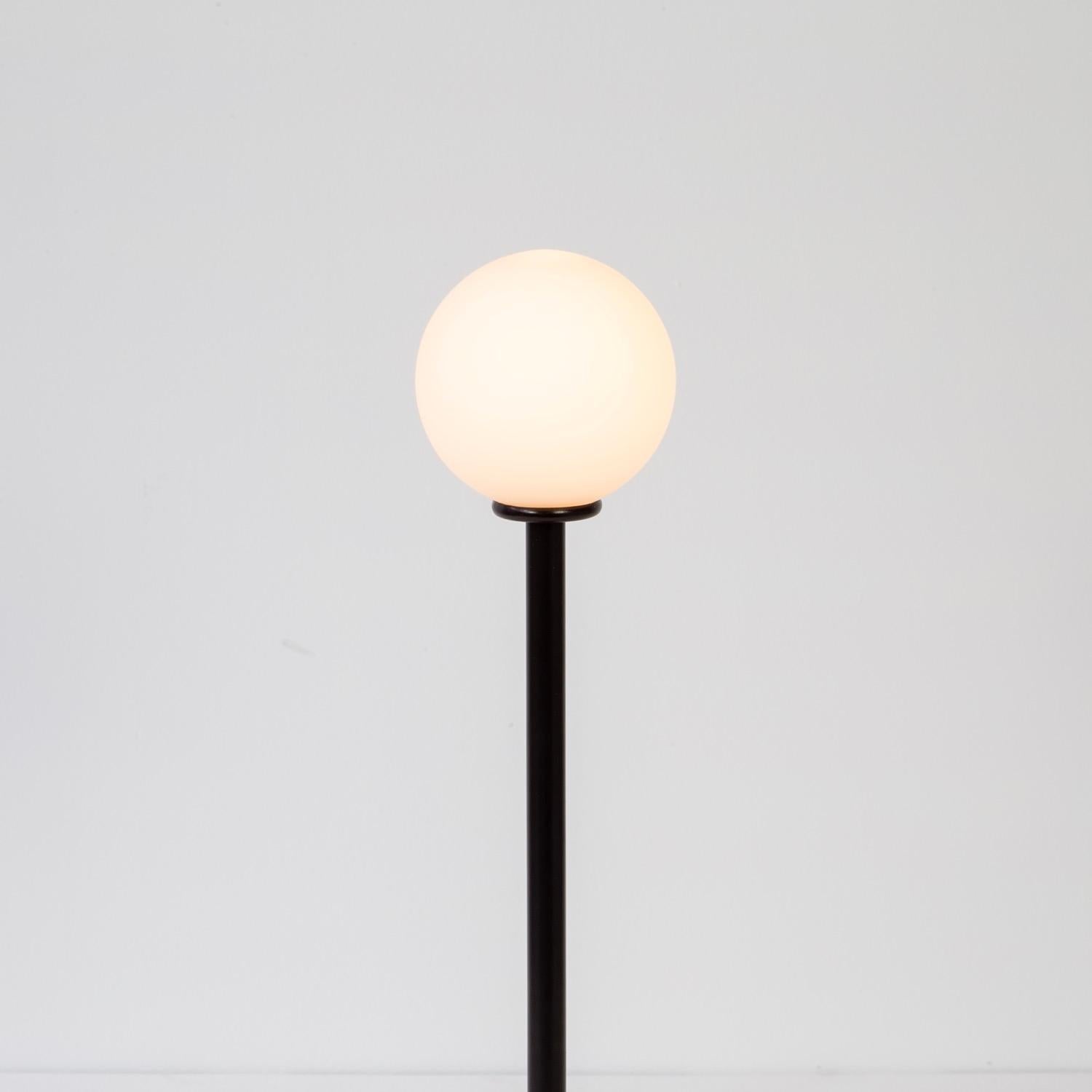 This listing is for 1x Globe Table Lamp in black manufactured by Research.Lighting. 

Materials: Steel, Marble, & Glass
Finish: Black
Electronics: 1x G9 Socket, 1x 4.5 Watt LED Bulb (included), 450 Lumens
Globe Size: ~3.25in
Inline Dimming