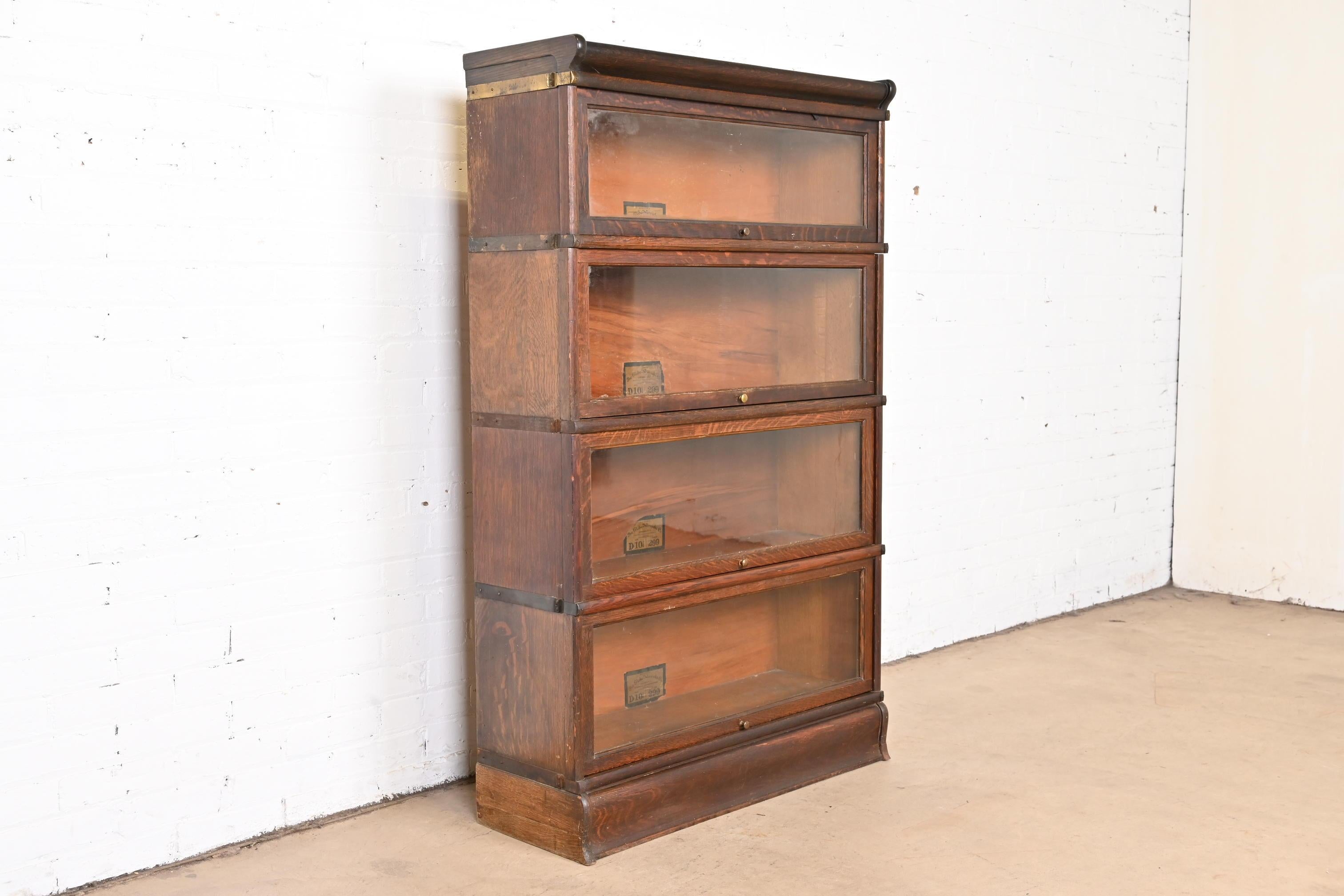 Early 20th Century Globe Wernicke Arts & Crafts Oak Four-Stack Barrister Bookcase, circa 1920s