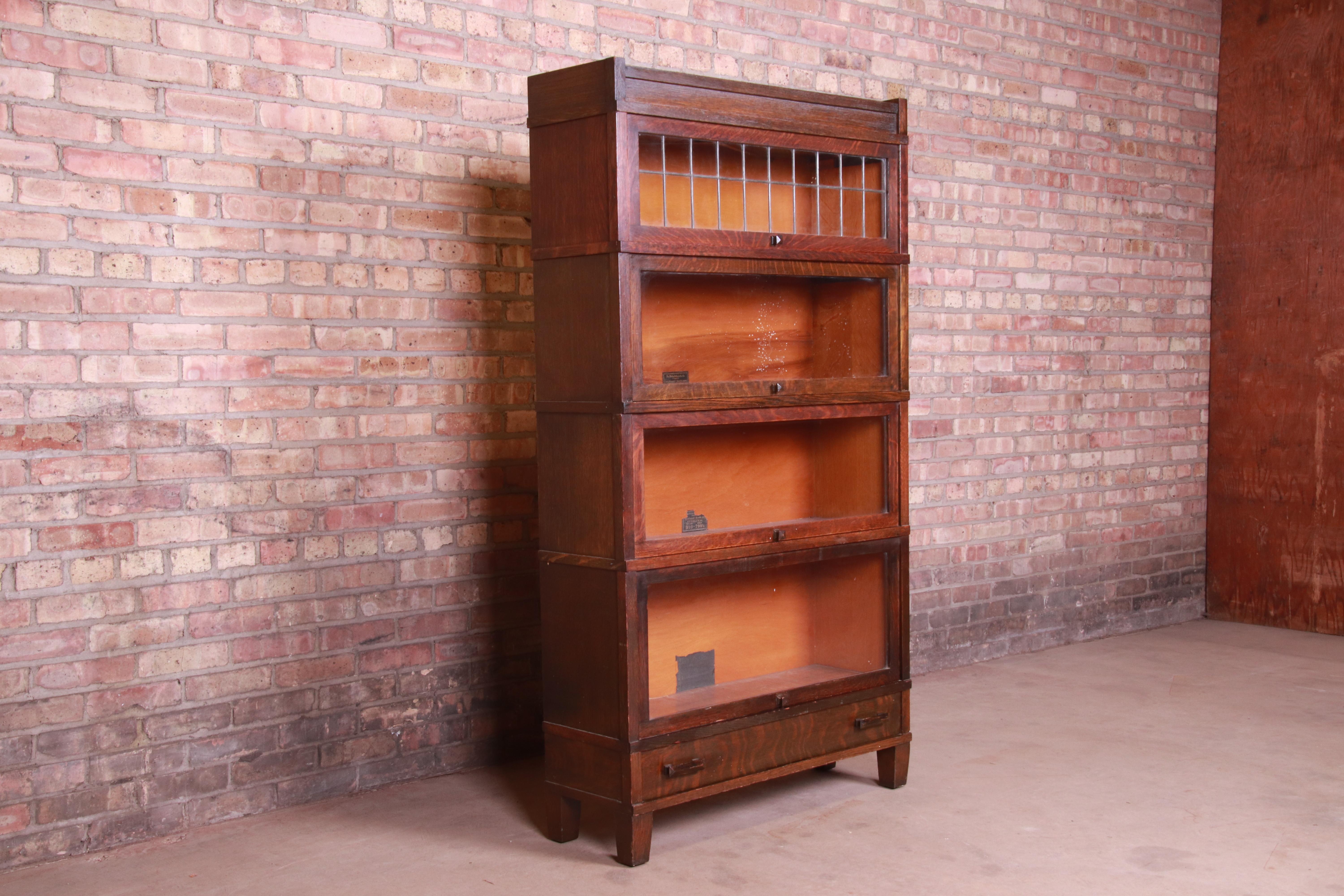 American Globe Wernicke Four-Stack Oak Barrister Bookcase with Leaded Glass, circa 1920s