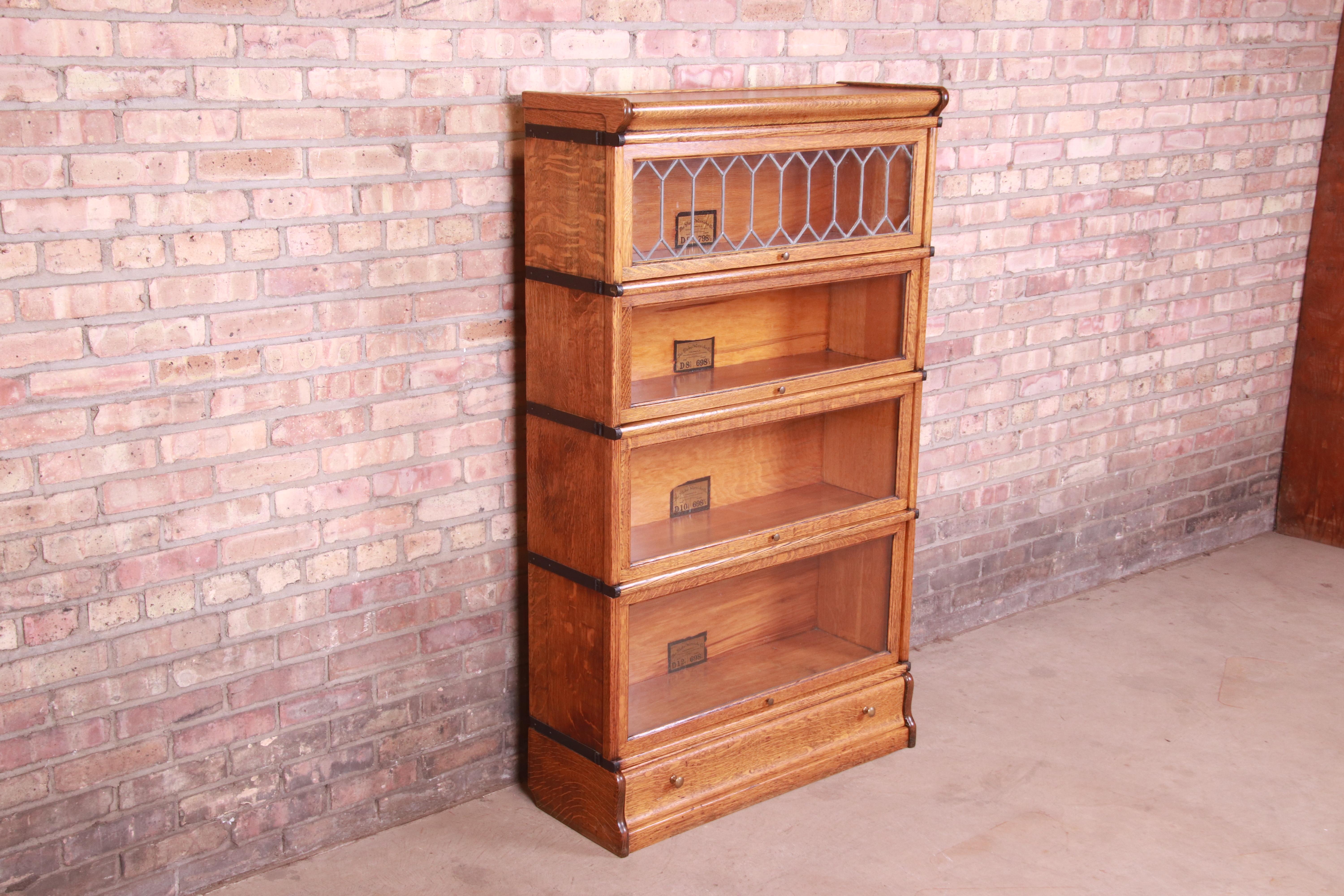 Globe Wernicke Oak Four-Stack Barrister Bookcase with Leaded Glass, circa 1900 In Good Condition In South Bend, IN