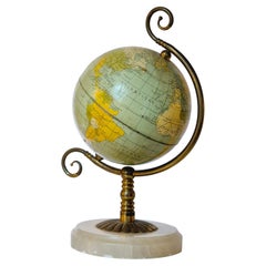 Globe with brass and onyx base, mid-1900s