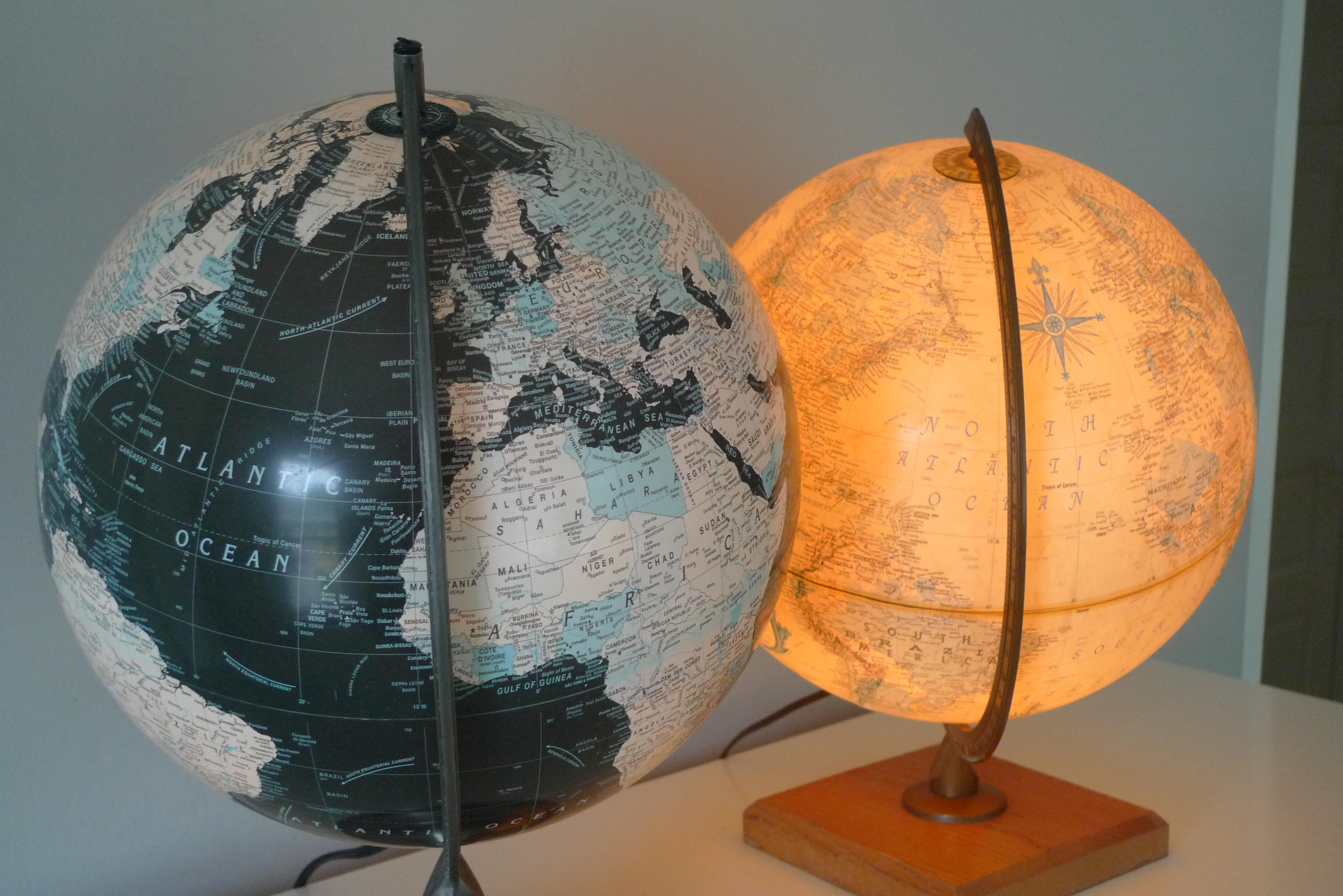 Modern Globes, an illuminated pair: World Premier and Scanglobe by Replogle. 