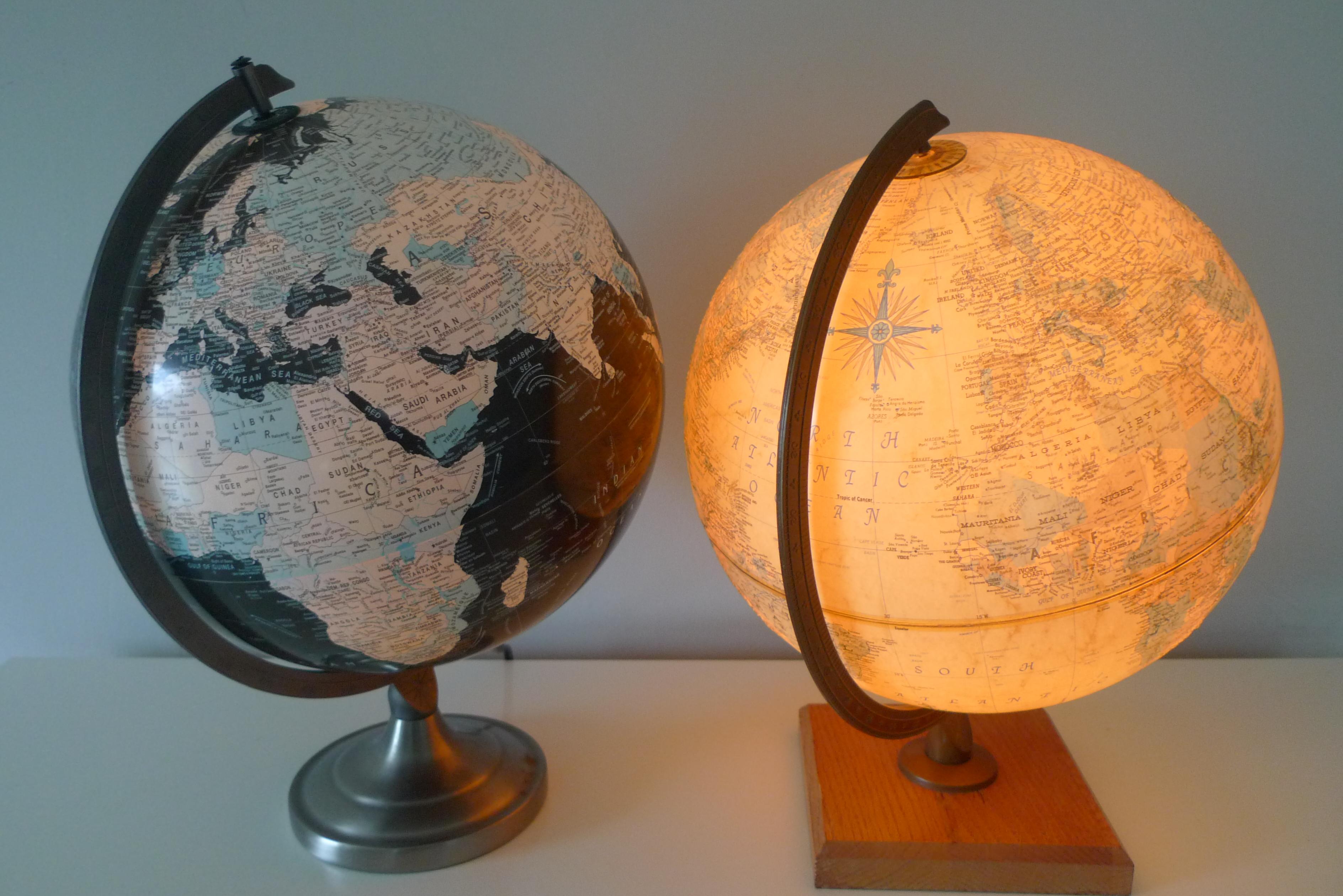 American Globes, an illuminated pair: World Premier and Scanglobe by Replogle. 