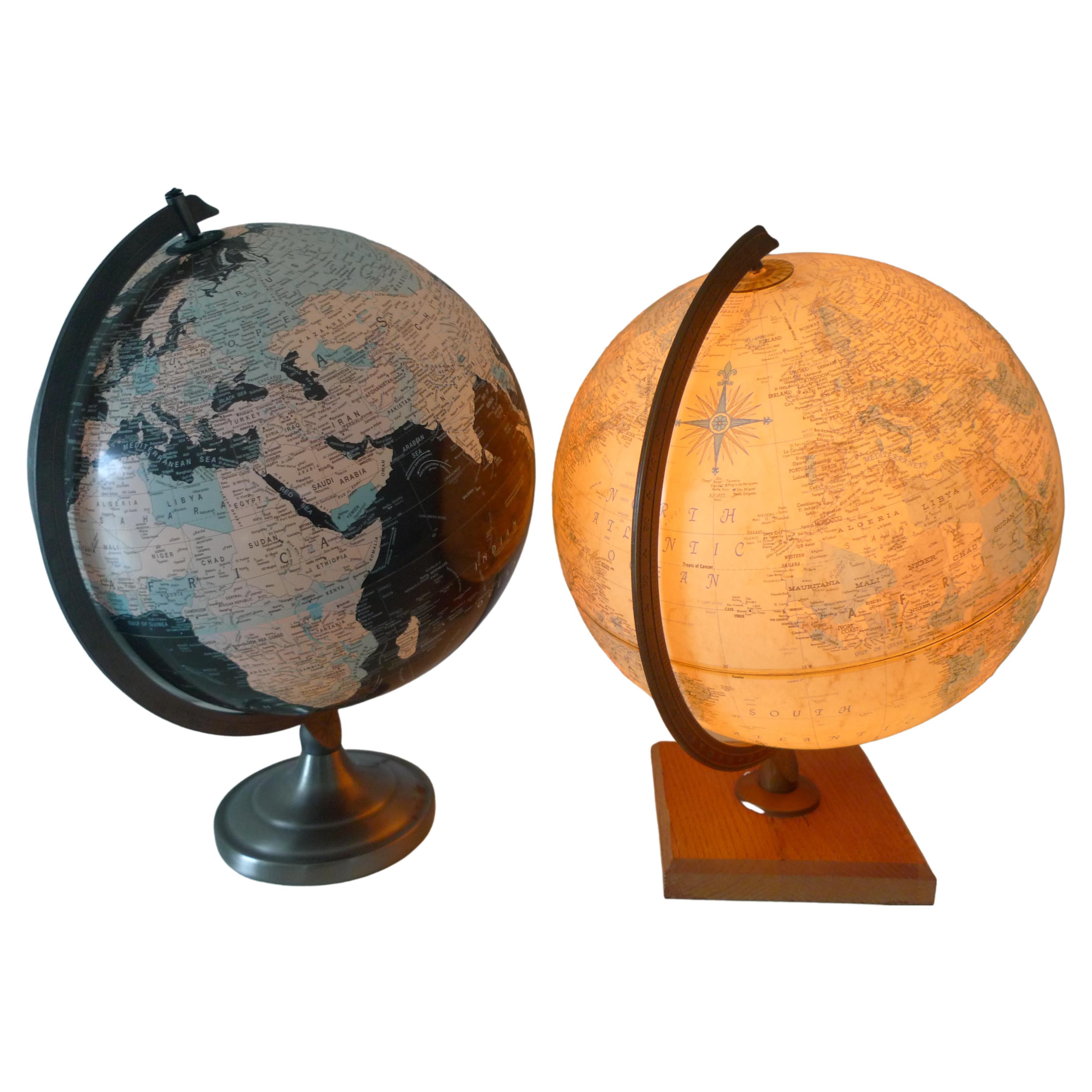 Globes, an illuminated pair: World Premier and Scanglobe by Replogle. 