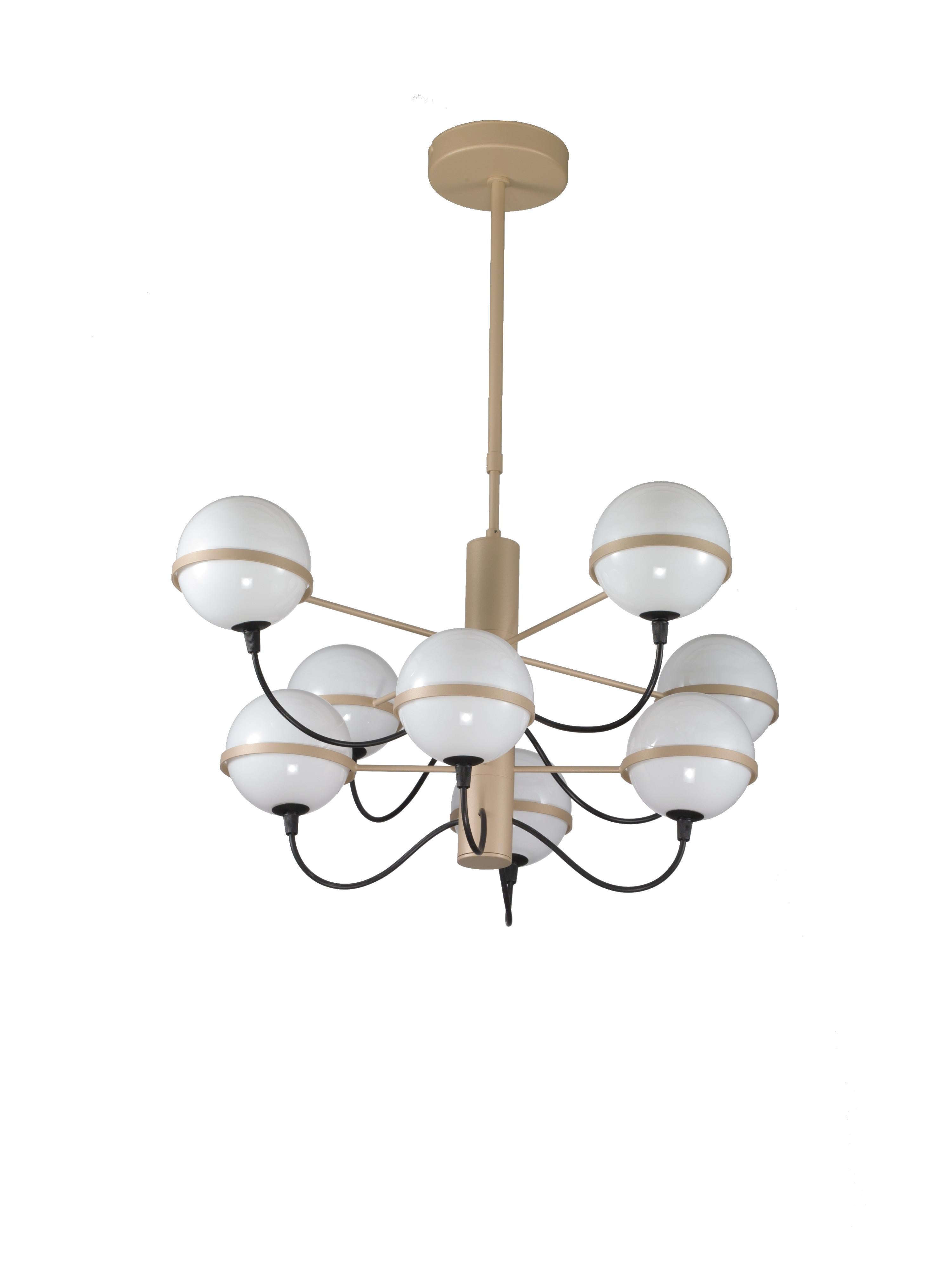Araña italiana con ocho globos de cristal opalino blanco sostenidos por una estructura metálica de color champán / Fabricada en Italia por Fabio Ltd inspirada en Gino Sarfatti
Diámetro: 26 pulgadas / Altura: 12 pulgadas más varilla y dosel
8 luces /