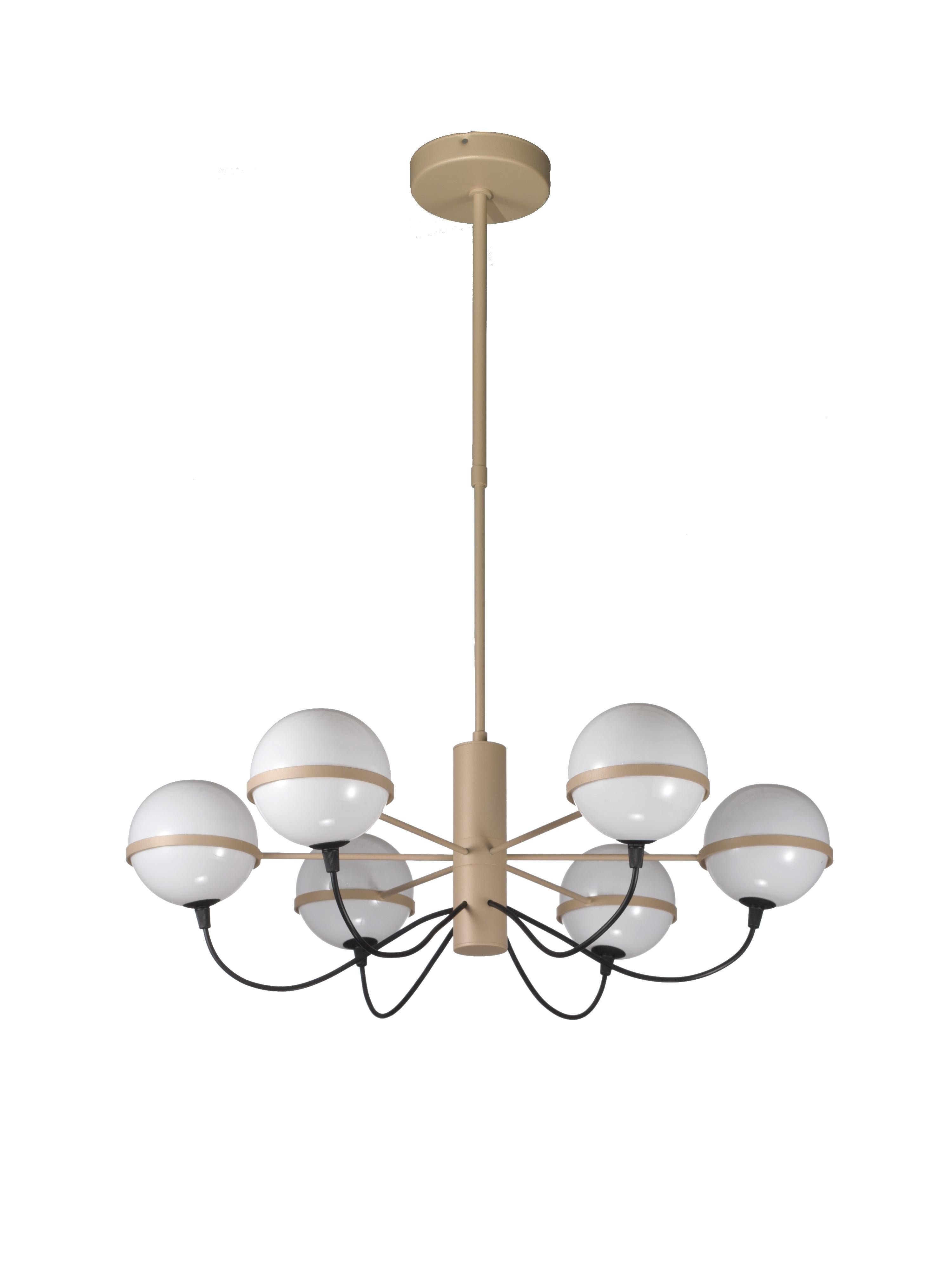 Araña italiana con seis globos de cristal opalino blanco sostenidos por una estructura metálica de color champán / Fabricada en Italia por Fabio Ltd inspirada en Gino Sarfatti
Diámetro: 26 pulgadas / Altura: 8 pulgadas más varilla y dosel
6 luces /