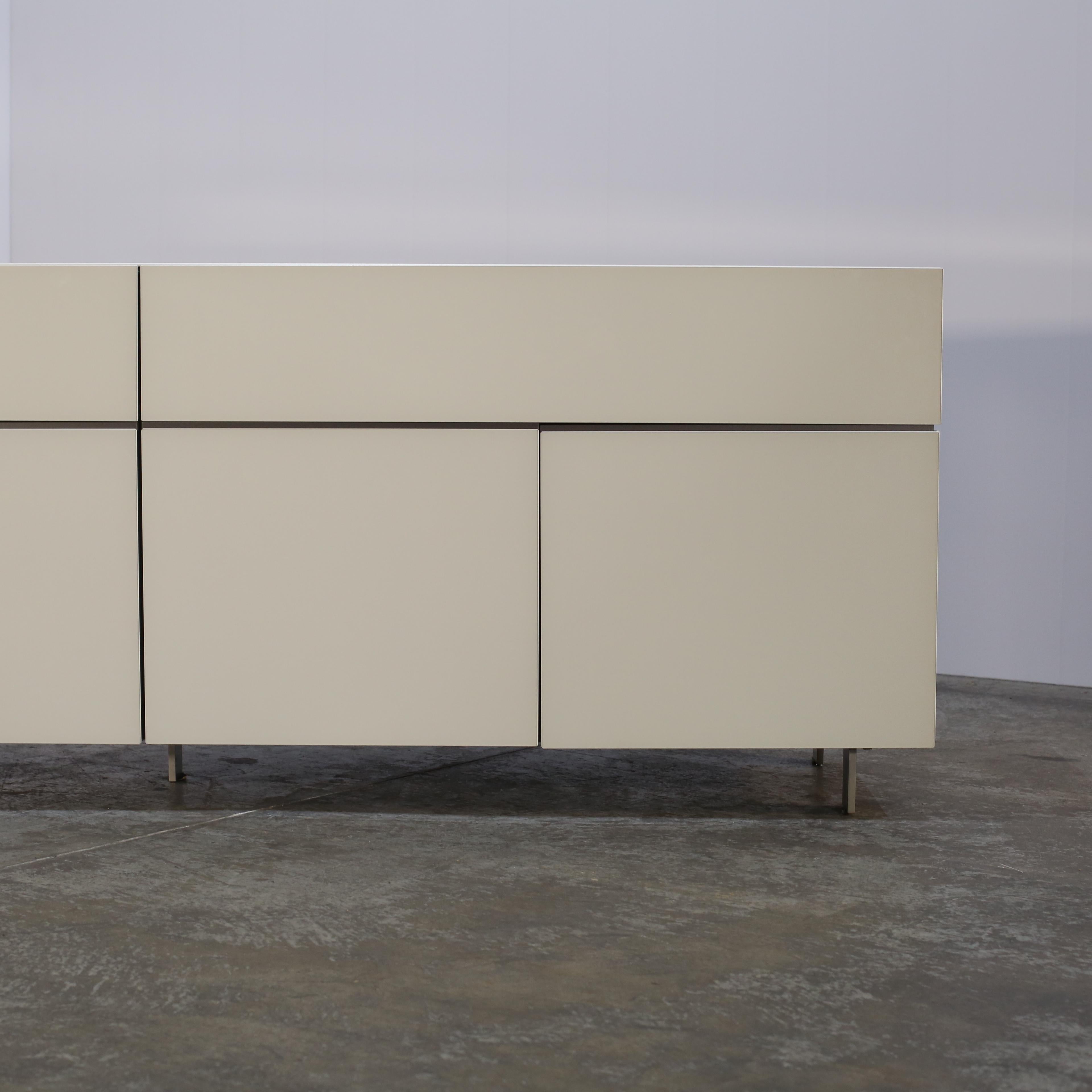 Introducing the stunning Globo Sideboard by Roche Bobois, a true statement piece for any luxury living space. Crafted with the finest materials, this sideboard features a sleek and modern design that adds a touch of elegance to any room. The high