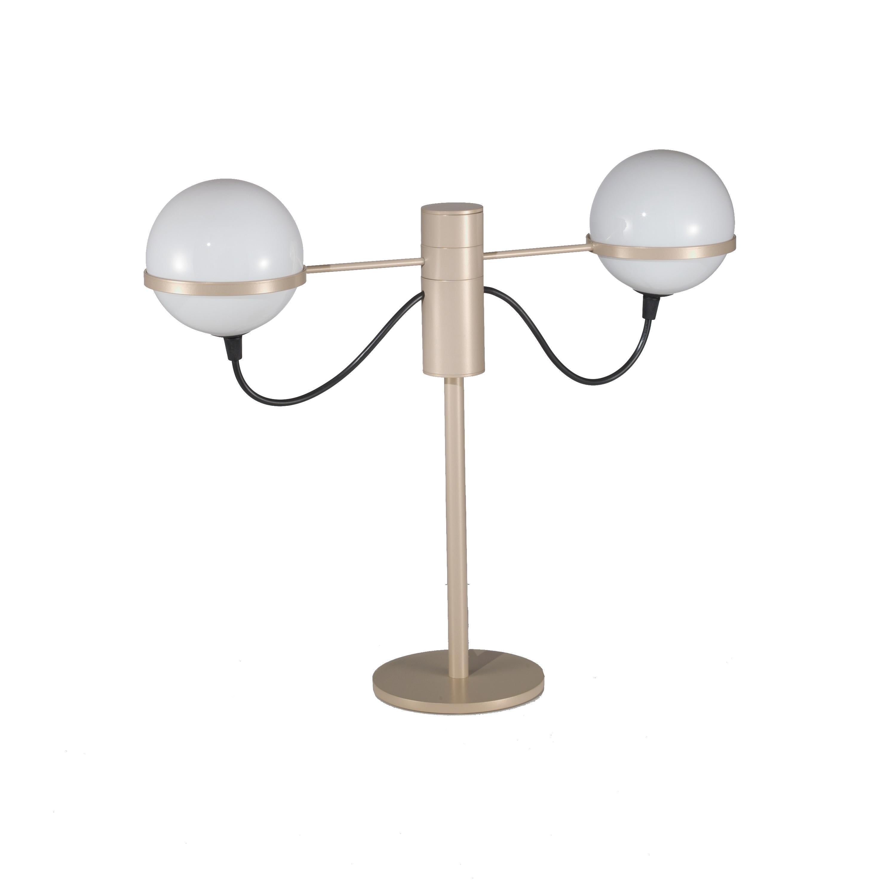 Italian table lamp with two white opaline glass globes held by champagne colored metal structure / Made in Italy by Fabio Ltd inspired by Gino Sarfatti
Width: 18 inches / Depth: 5.5 inches / Height: 16 inches
2 lights / G9 type / max 25W each
Order