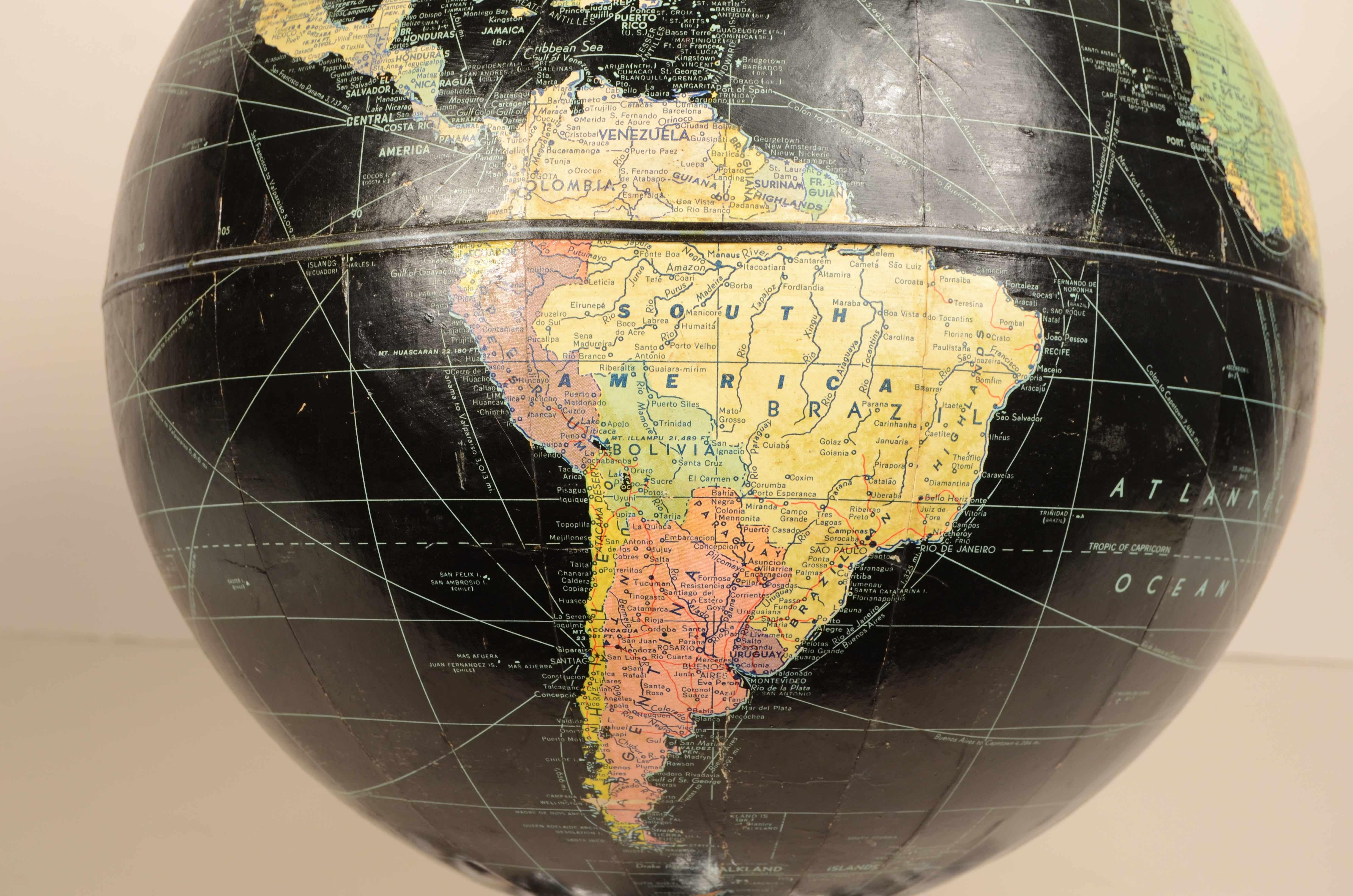 Earth globe with airplane-shaped base published in 1949 by Weber Costello Co. 6
