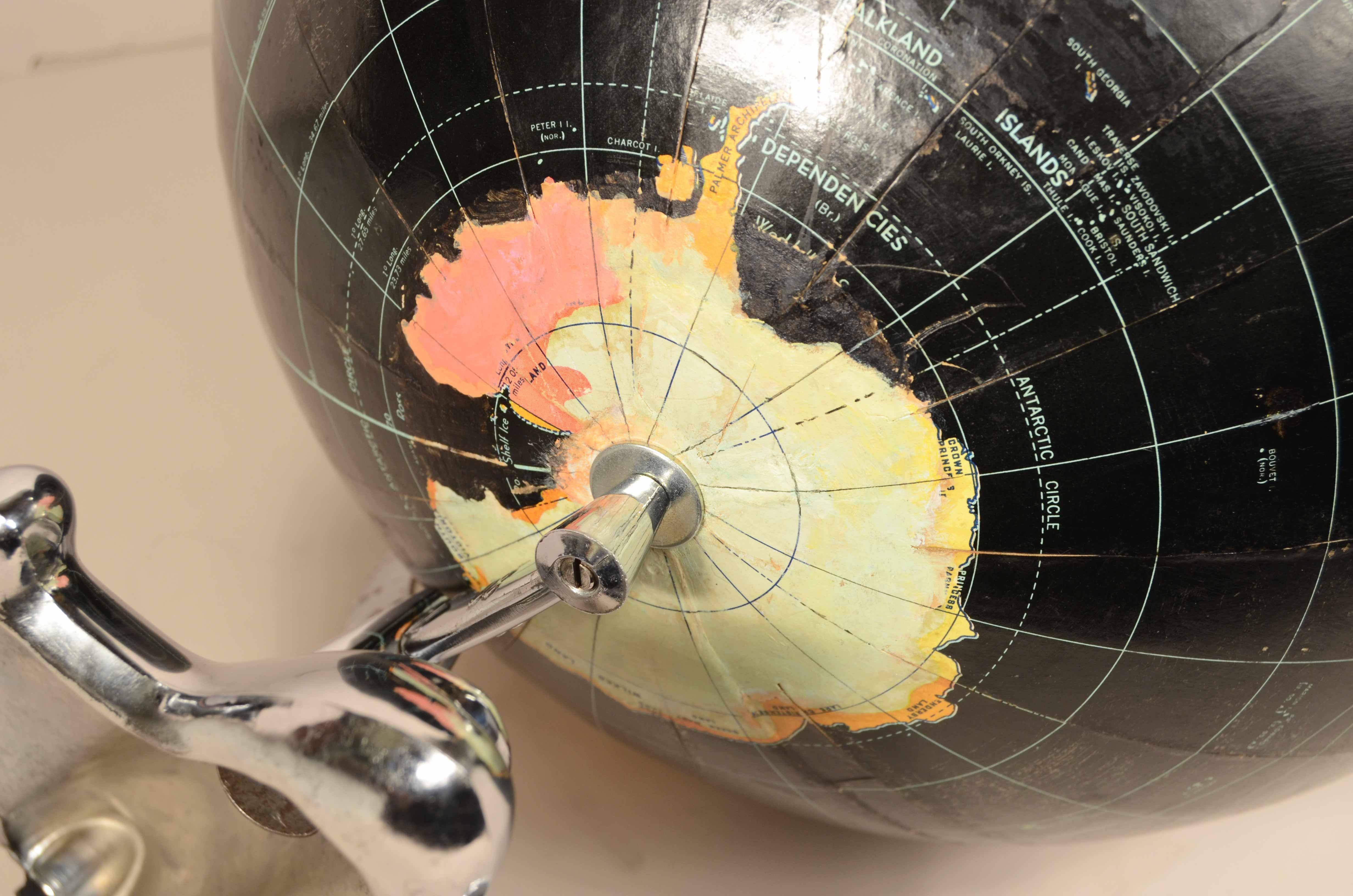 Earth globe with airplane-shaped base published in 1949 by Weber Costello Co. 10