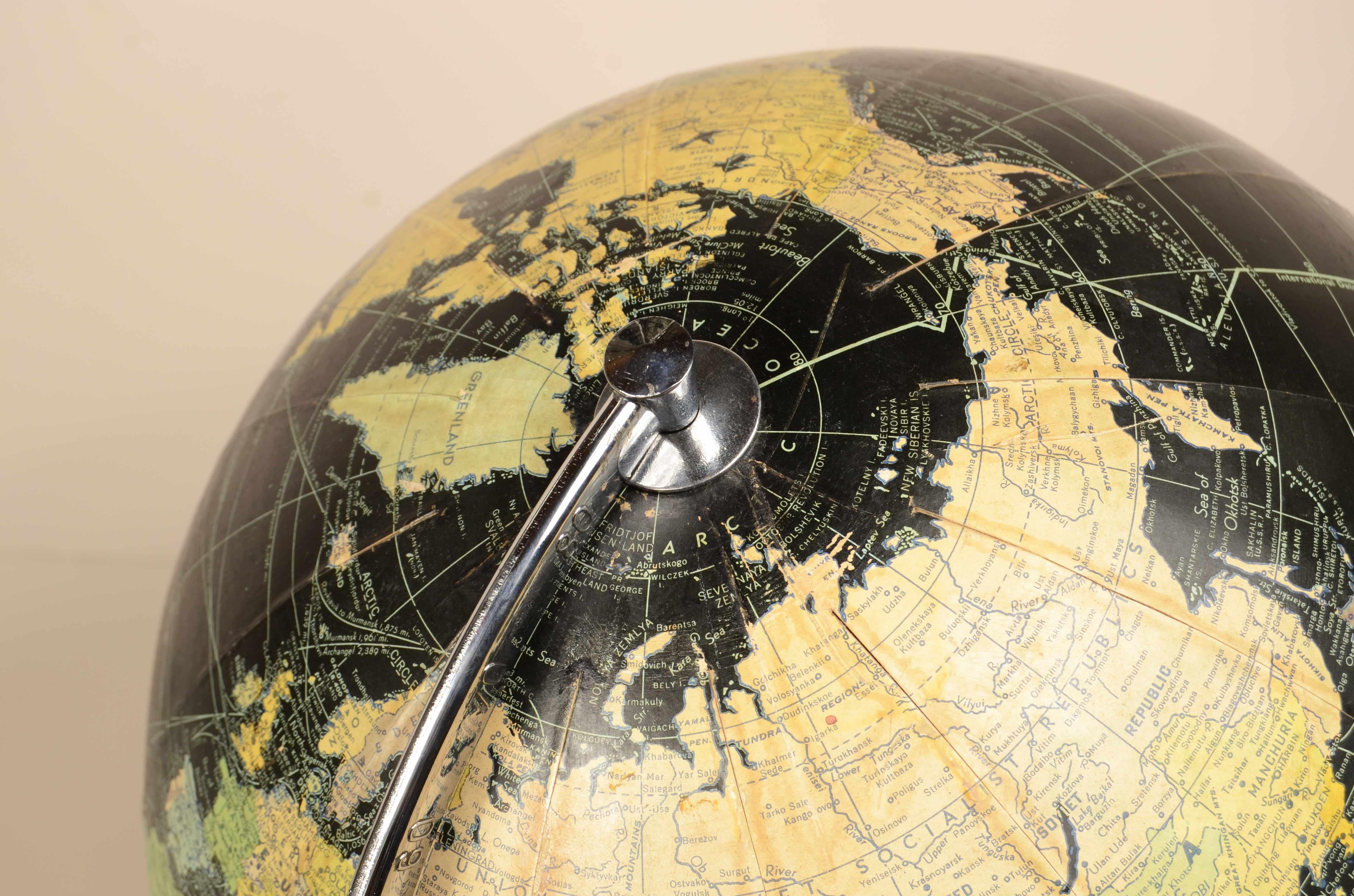 Earth globe with airplane-shaped base published in 1949 by Weber Costello Co. 11