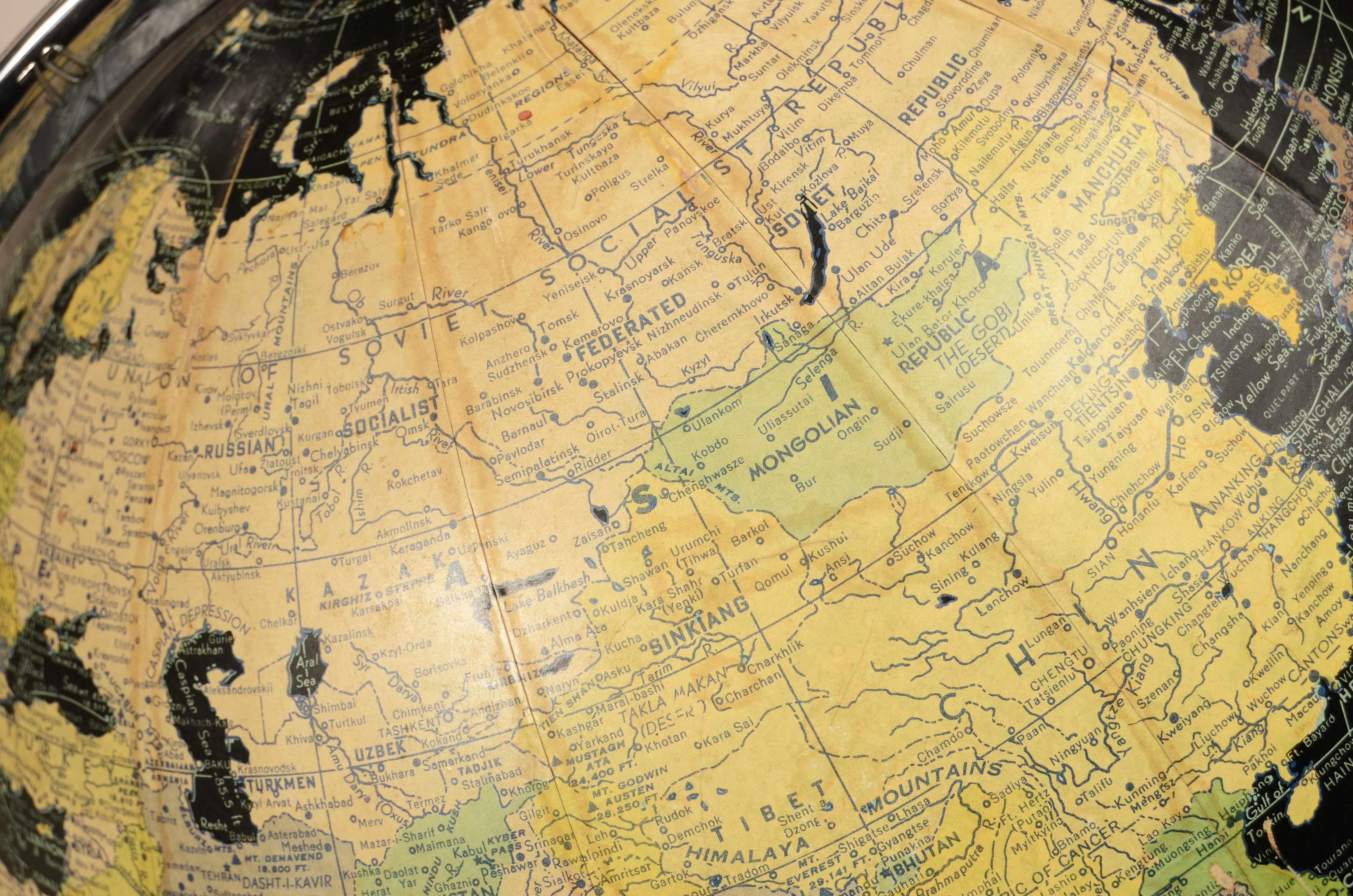 Earth globe with airplane-shaped base published in 1949 by Weber Costello Co. 13