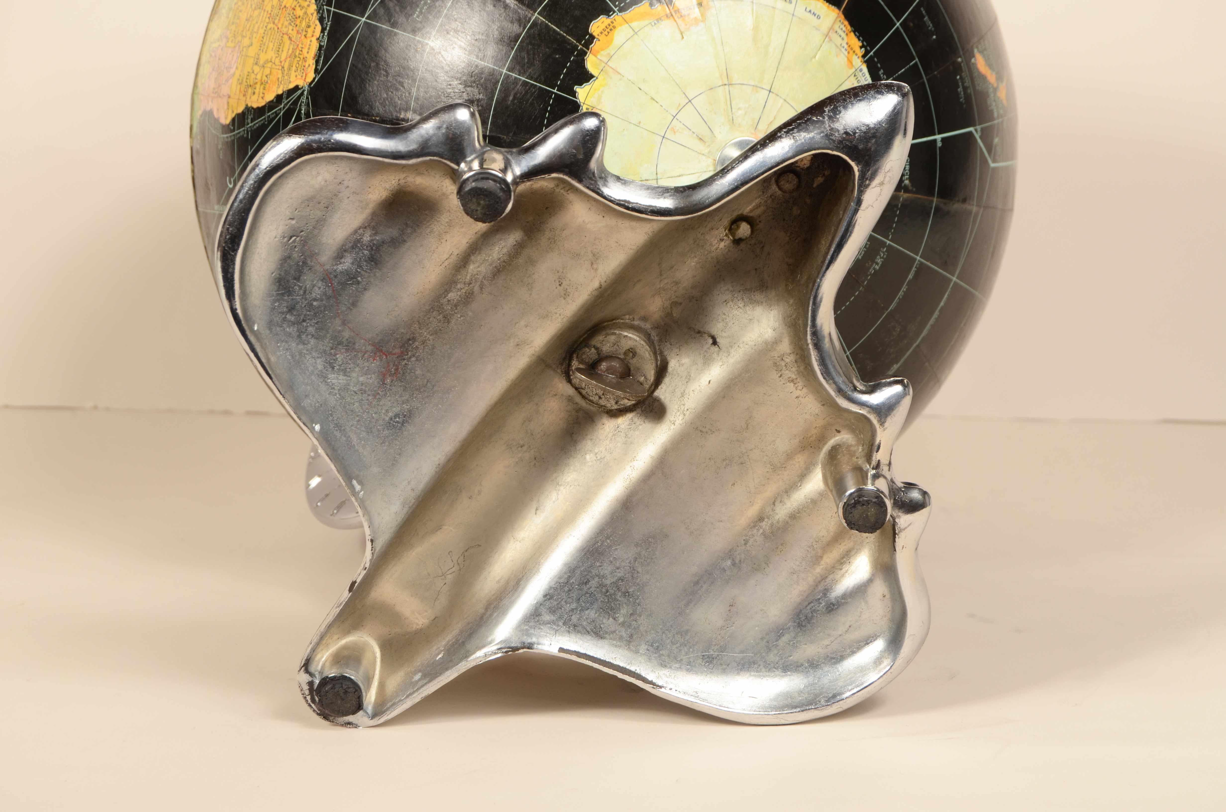 Earth globe with airplane-shaped base published in 1949 by Weber Costello Co. 14