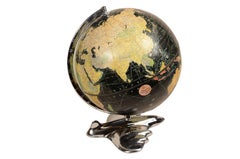 Earth globe with airplane-shaped base published in 1949 by Weber Costello Co.
