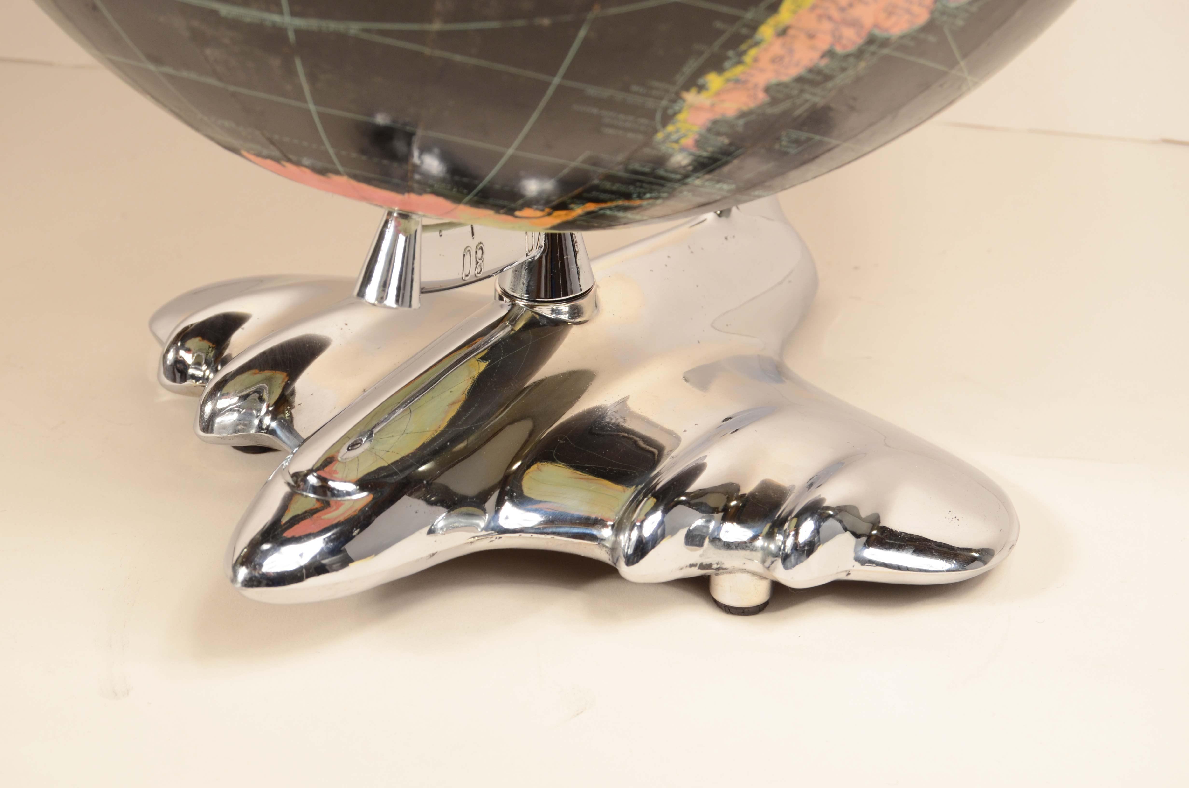 Mid-20th Century Earth globe with airplane-shaped base published in 1949 by Weber Costello Co.