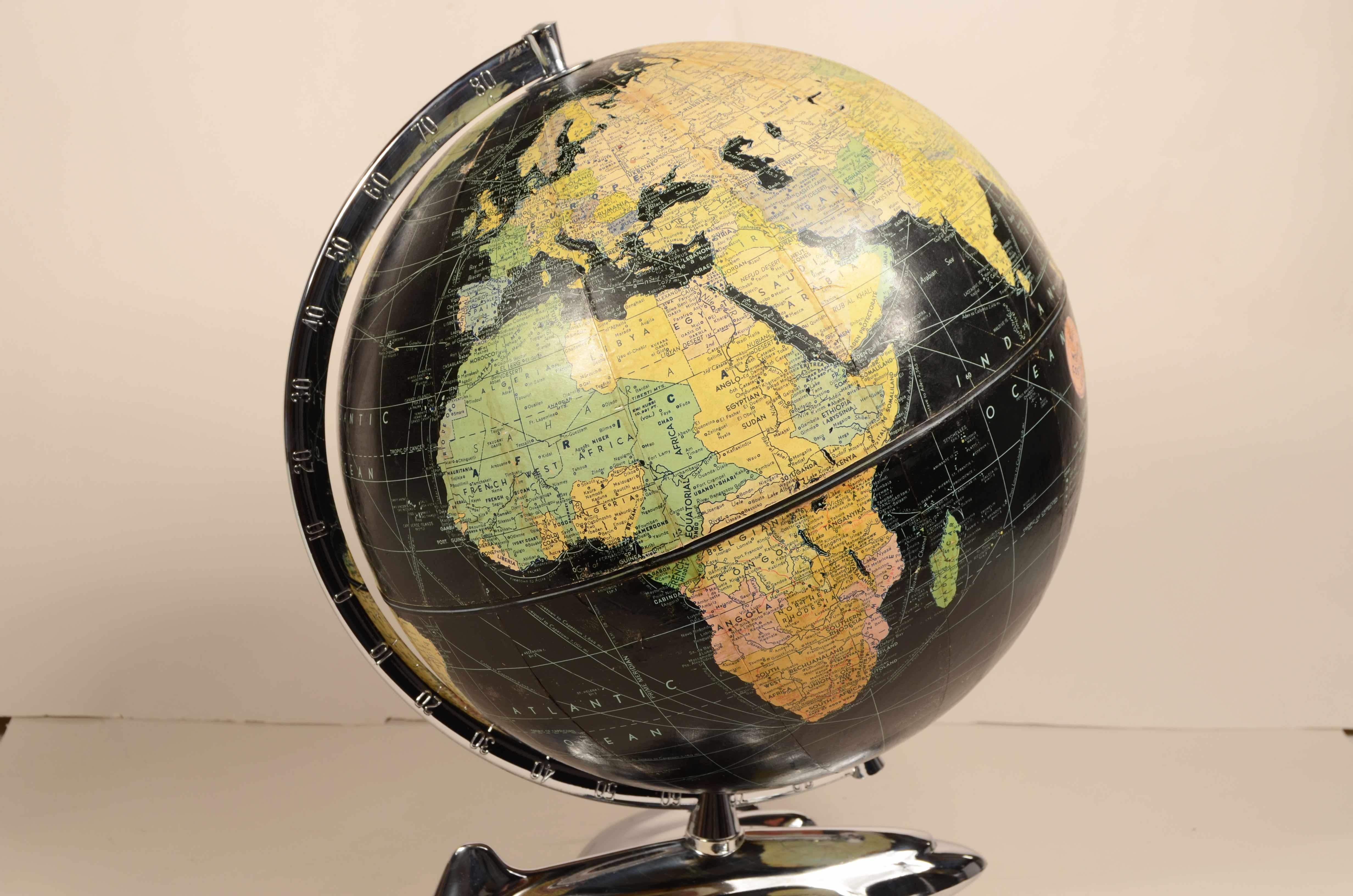Paper Earth globe with airplane-shaped base published in 1949 by Weber Costello Co.