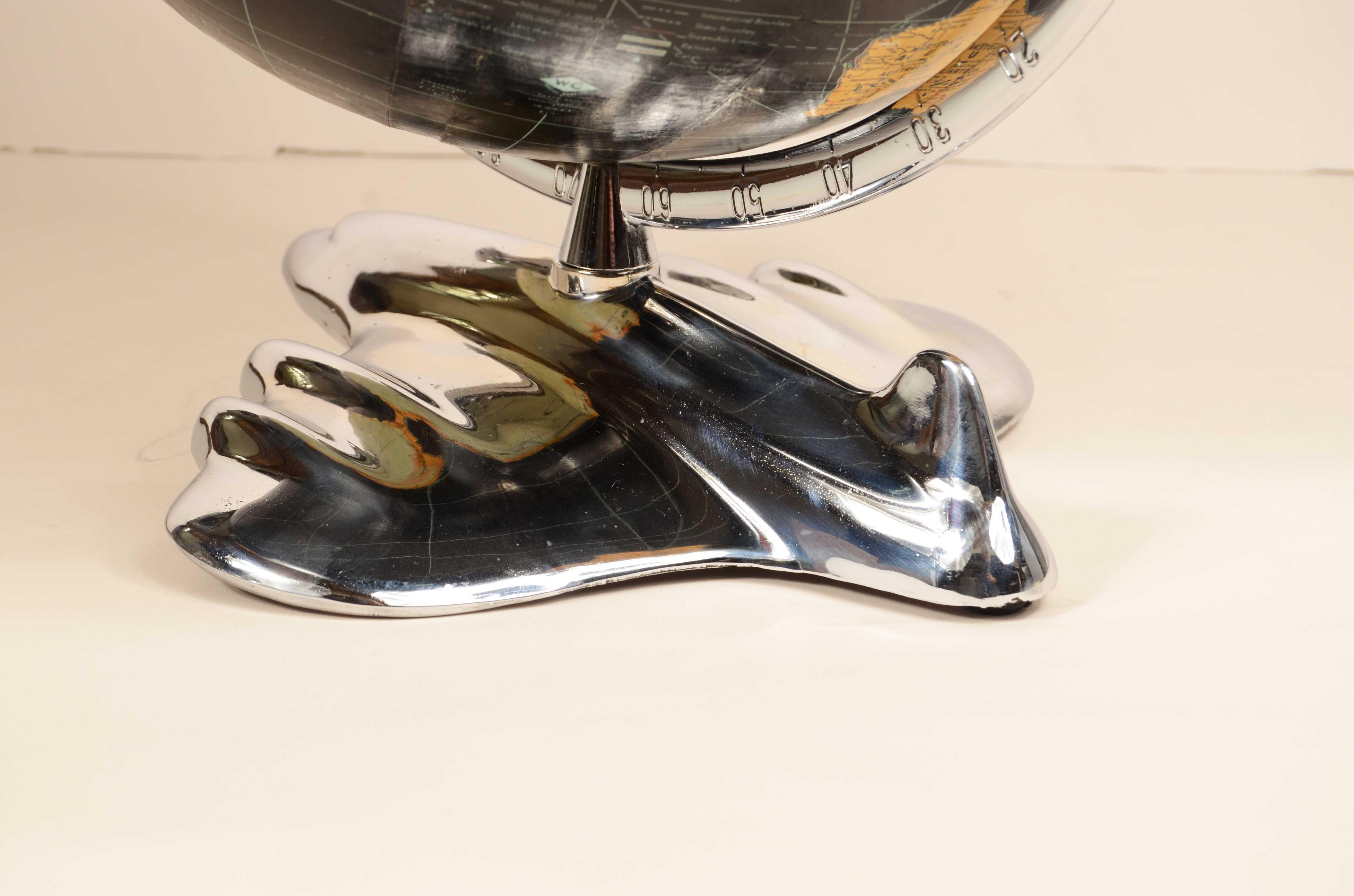 Earth globe with airplane-shaped base published in 1949 by Weber Costello Co. 1