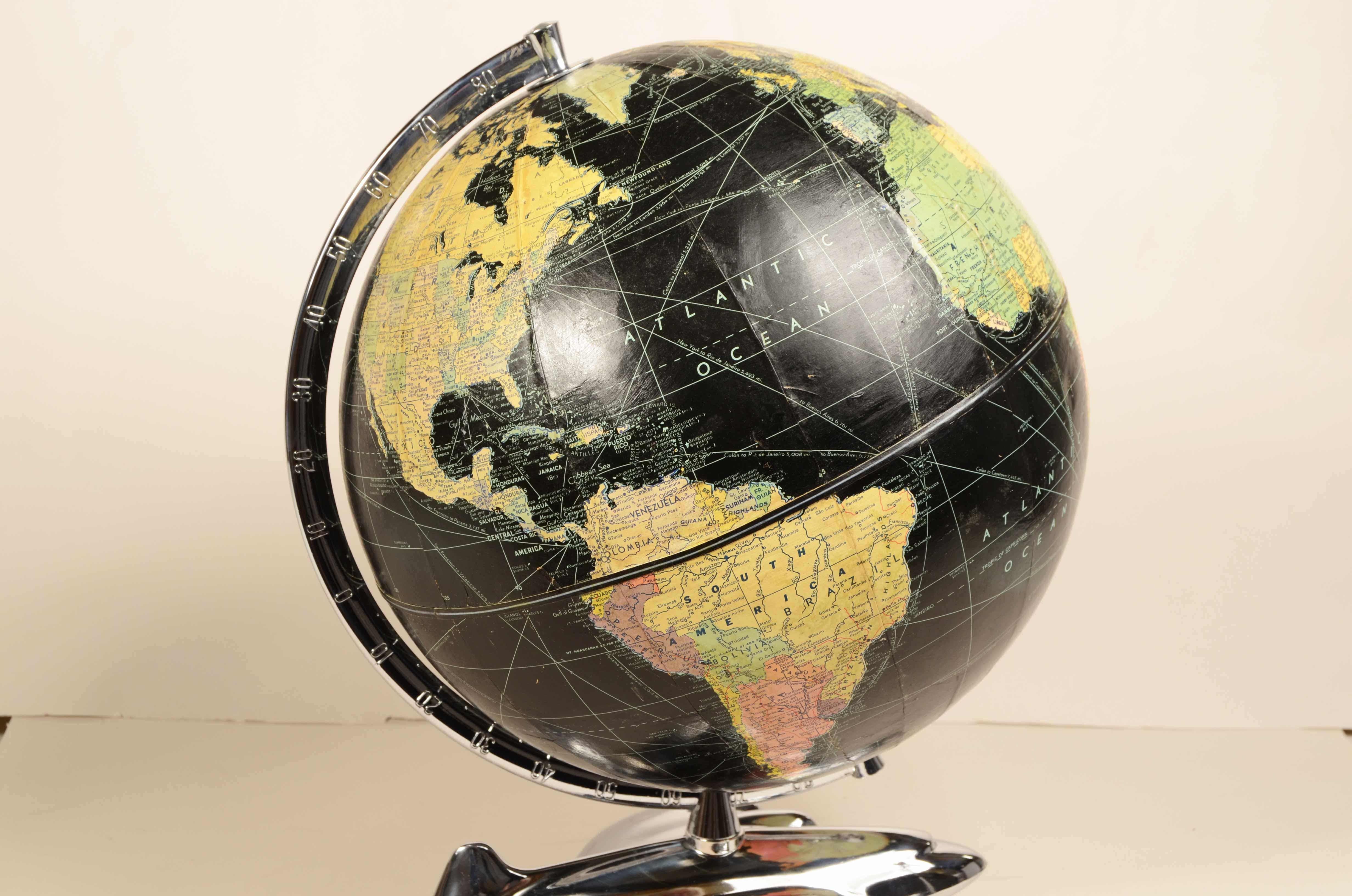 Earth globe with airplane-shaped base published in 1949 by Weber Costello Co. 2