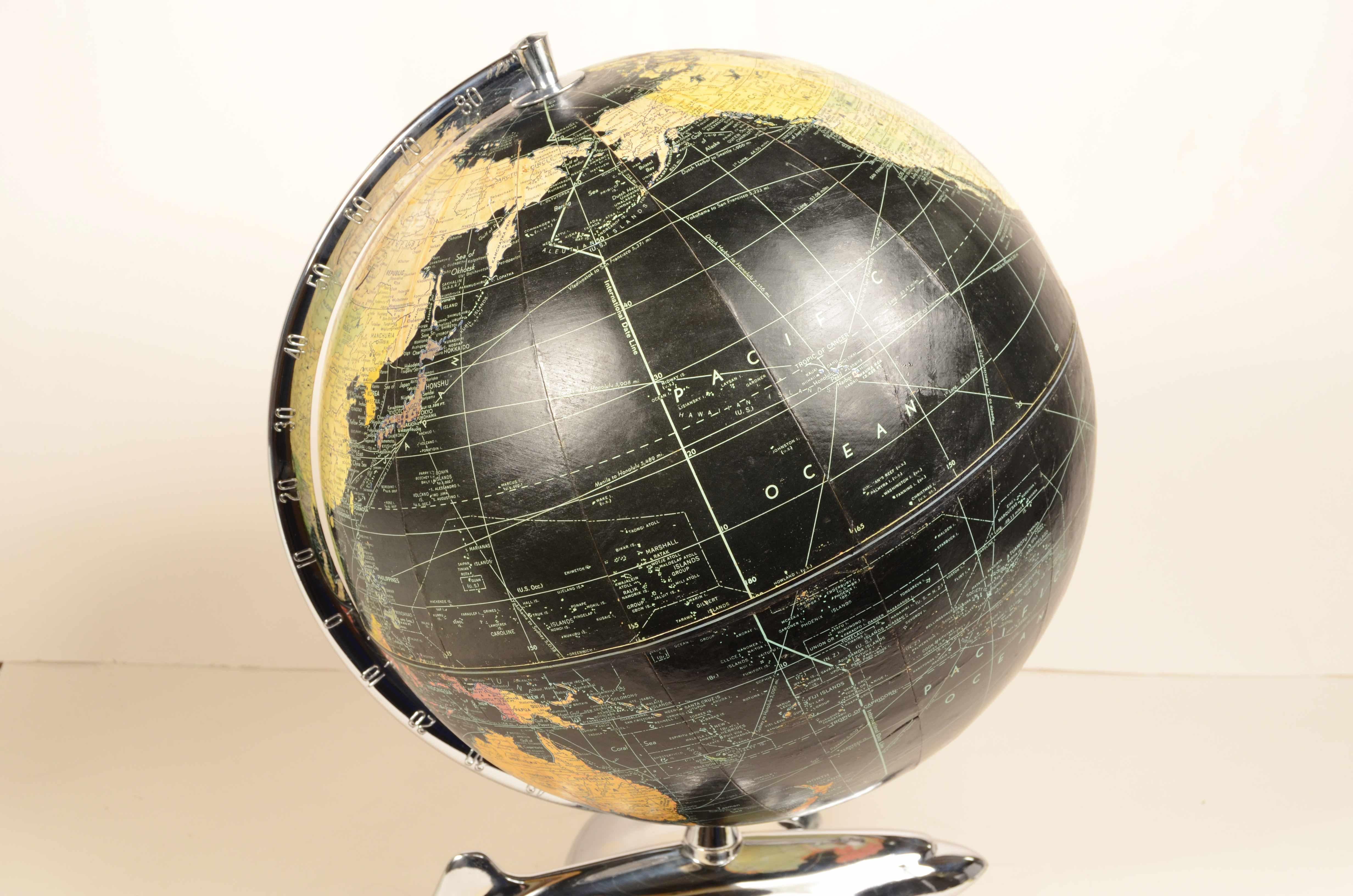 Earth globe with airplane-shaped base published in 1949 by Weber Costello Co. 4
