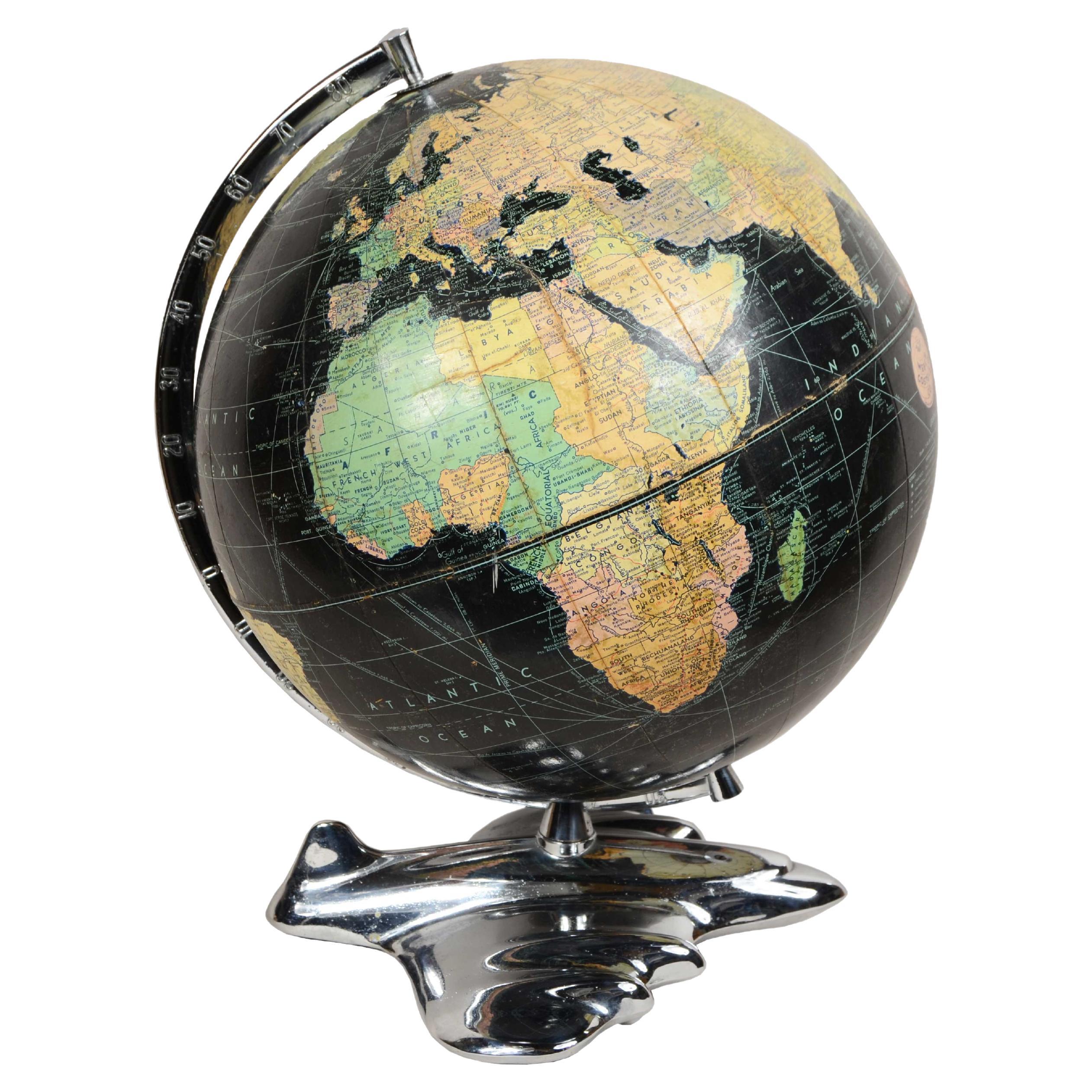 Earth globe with airplane-shaped base published in 1949 by Weber Costello Co.  For Sale