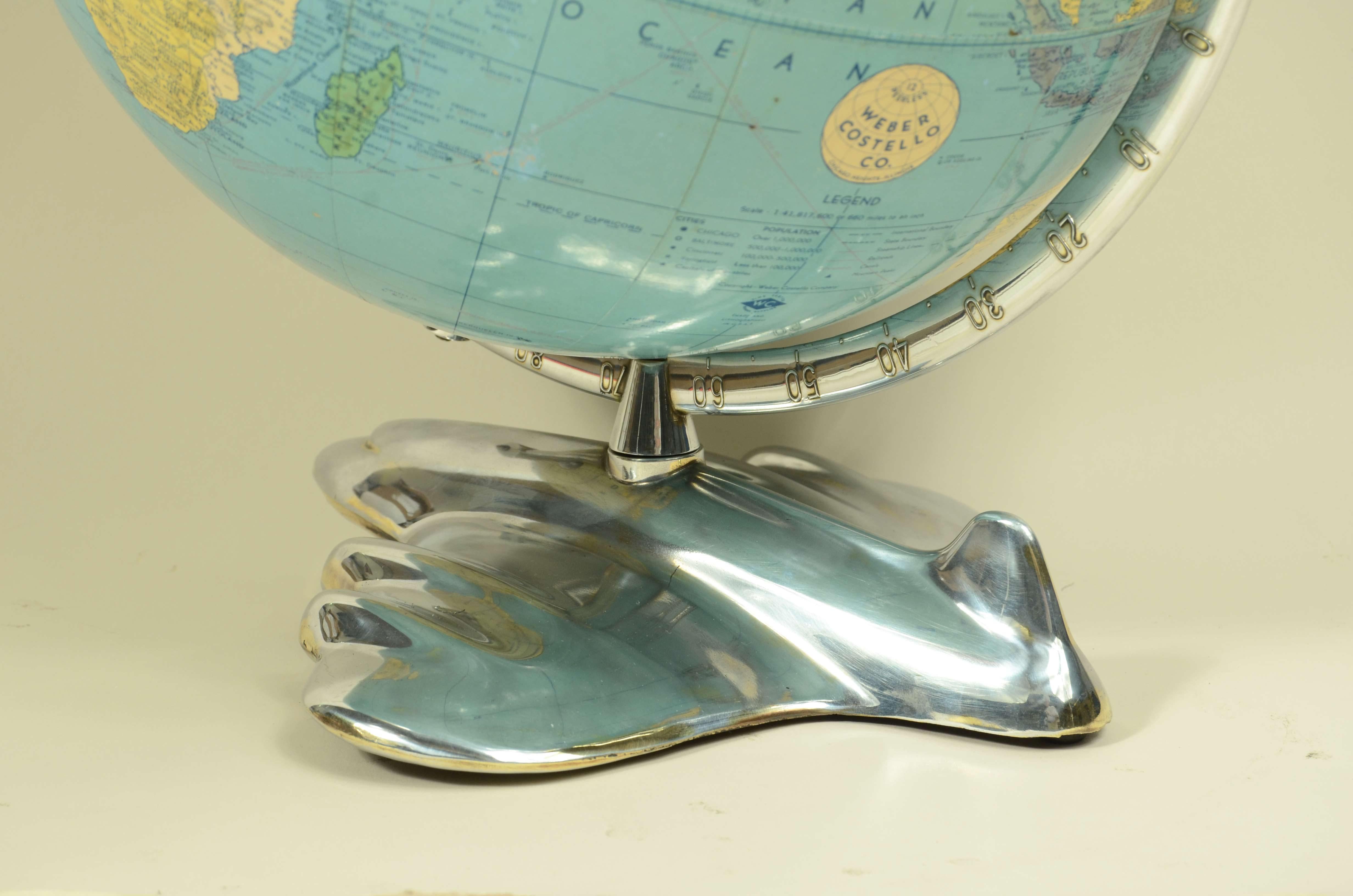 Carta Globo terrestre con base a forma di aereo edito nel 1956 da Weber Costello Co in vendita