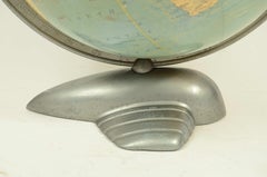 Earth globe with stylized airplane base Art Deco Weber Costello
