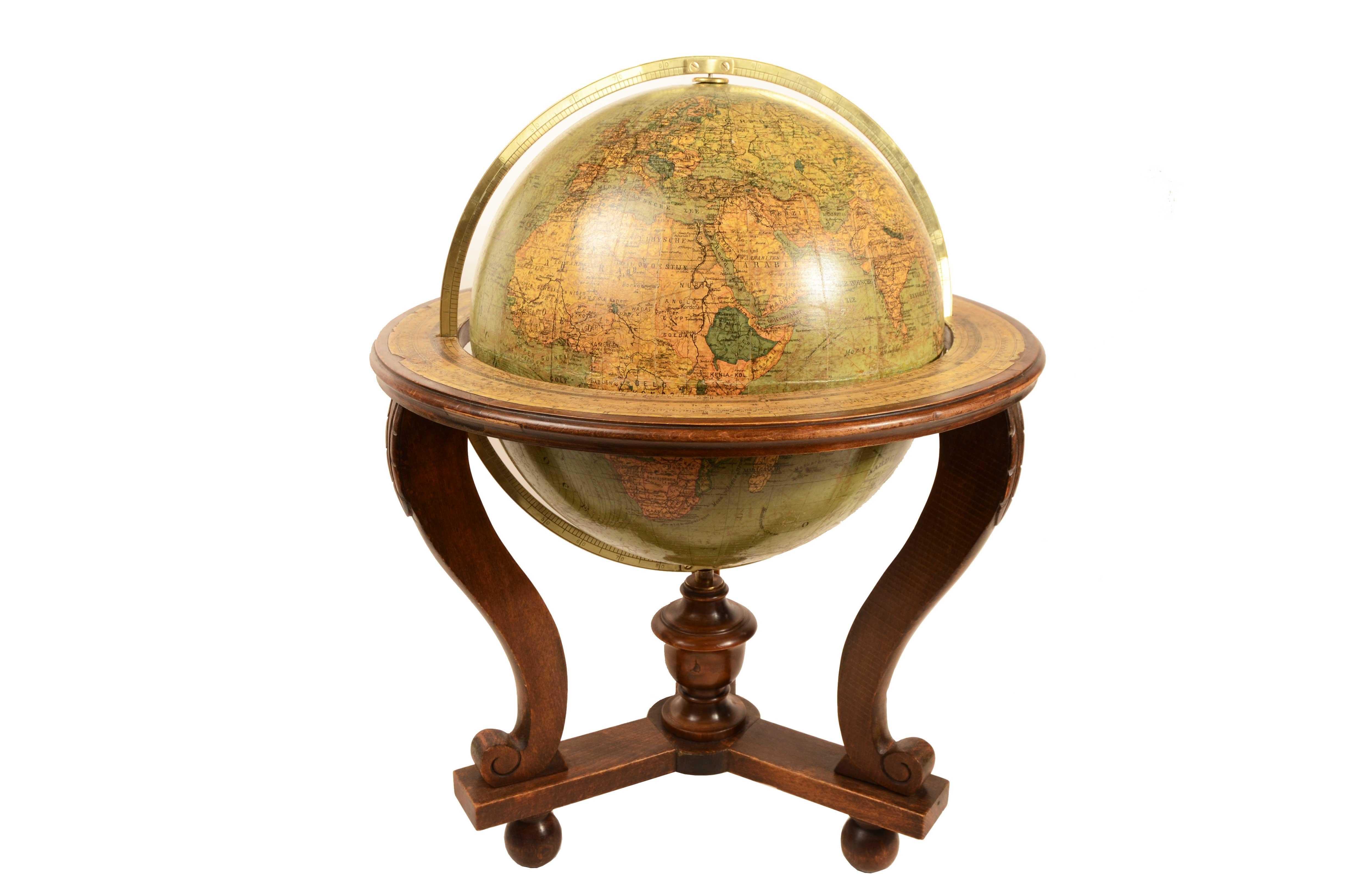 Earth globe published for the Dutch market in the early 20th century by the Columbus publishing house, the cartouche reads: Dr. R. Neuse's Aardglobe. Nederlandsche bewerking van R.E. KALTOFEN Leeraar Rijks H.B.S. Utrecht UITGAVE ERVEN J. BIJLEVELD.