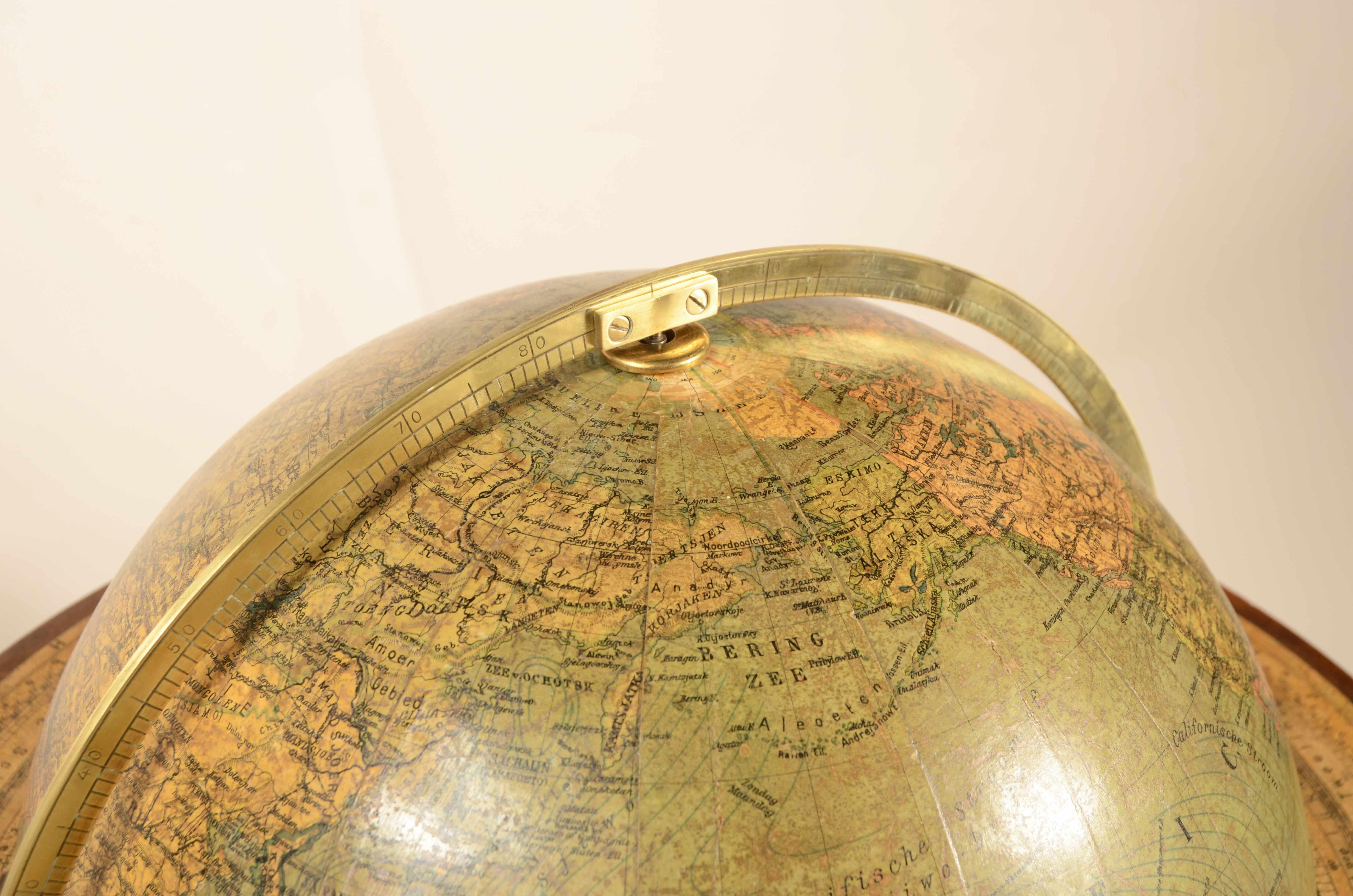 Paper German Columbus terrestrial globe for the Dutch market early 20th century For Sale