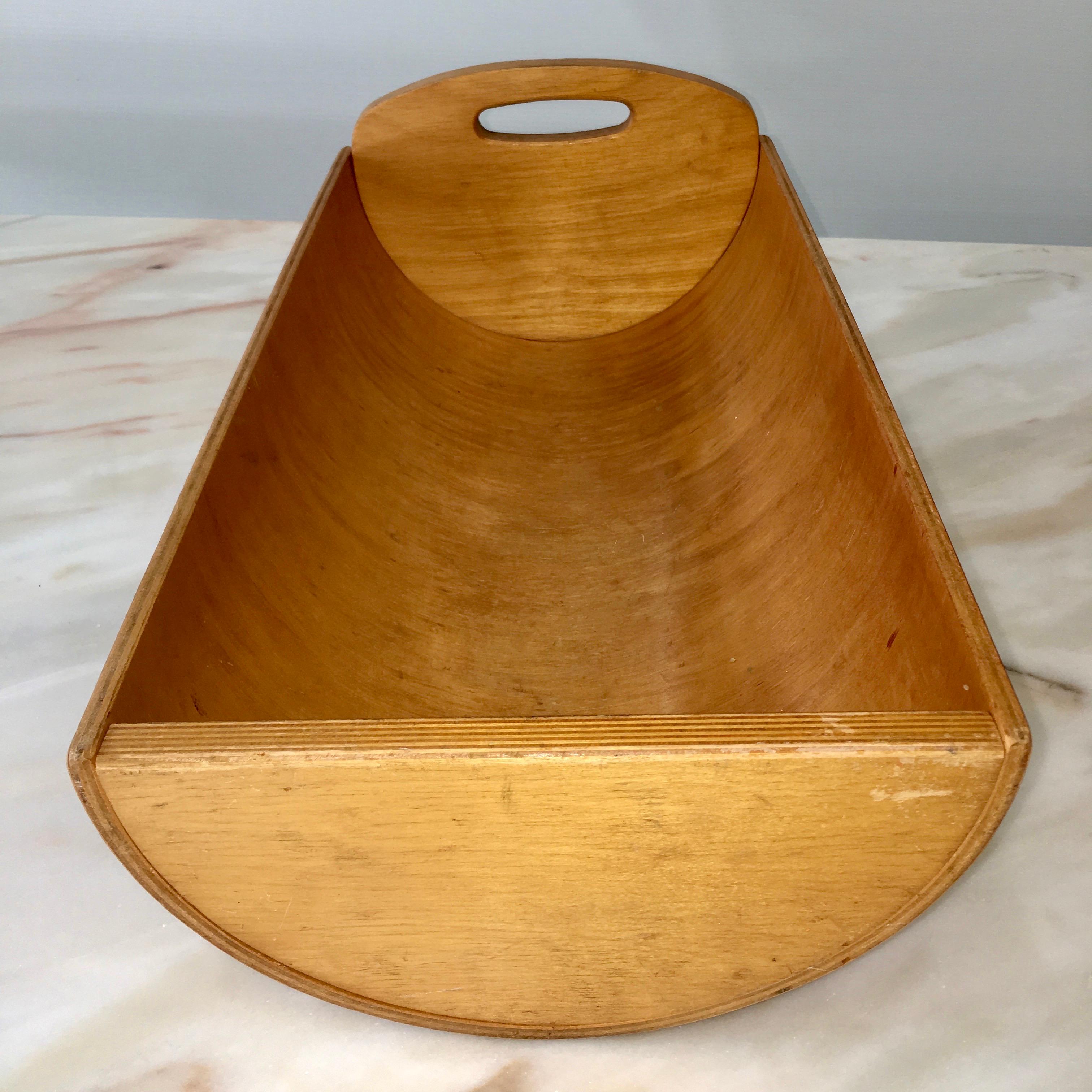 Molded plywood doll cradle by Gloria Caranica for Creative Playthings, circa 1956.
Creative playthings of Princeton, NJ was founded in 1949 by Frank & Theresa Kaplan and Bernard & Edith Barenholtz, educators and pioneers in the design and
