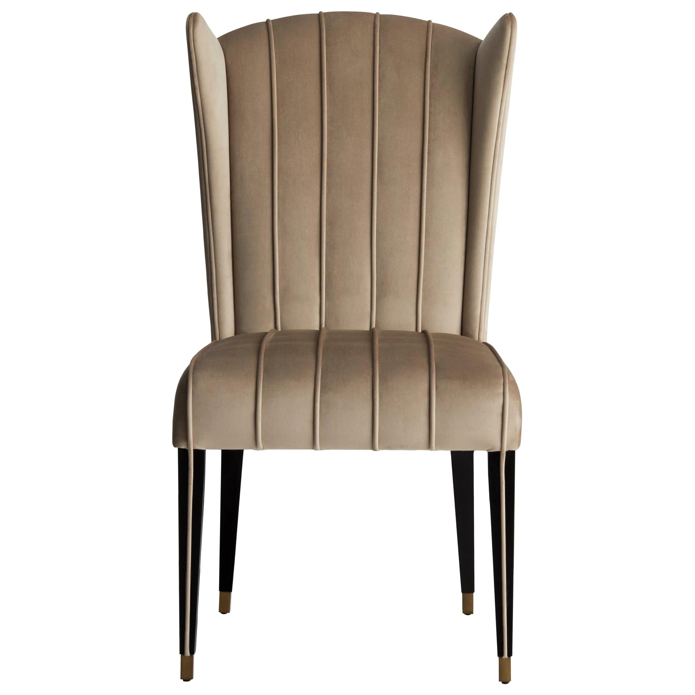 The style of the dining chair GLORIA II makes it suitable for most interior styles.‎‎ The detail of the piping runs along the legs, continuing for the seat and the back of the chair, which design was developed for a superior comfort feeling.‎‎